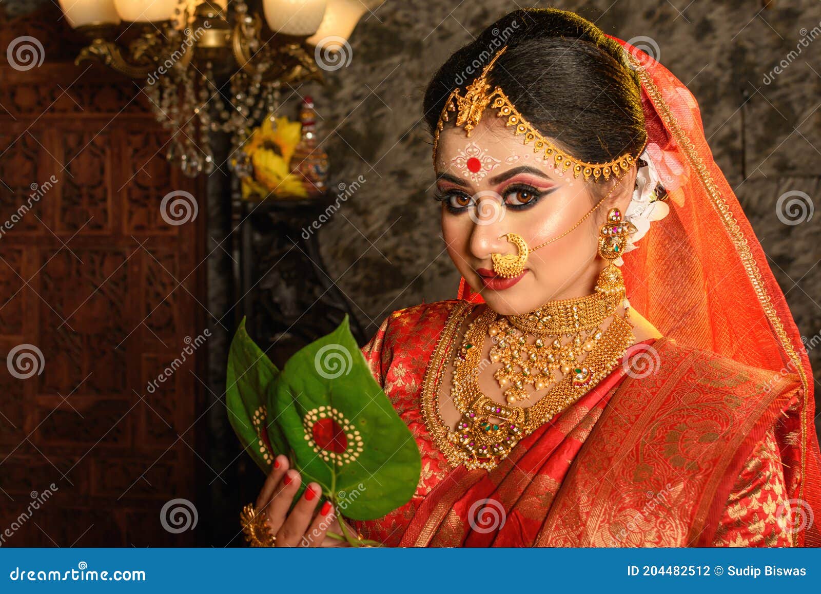 Portrait of Very Beautiful Indian Bride Holding Betel Leaf ...