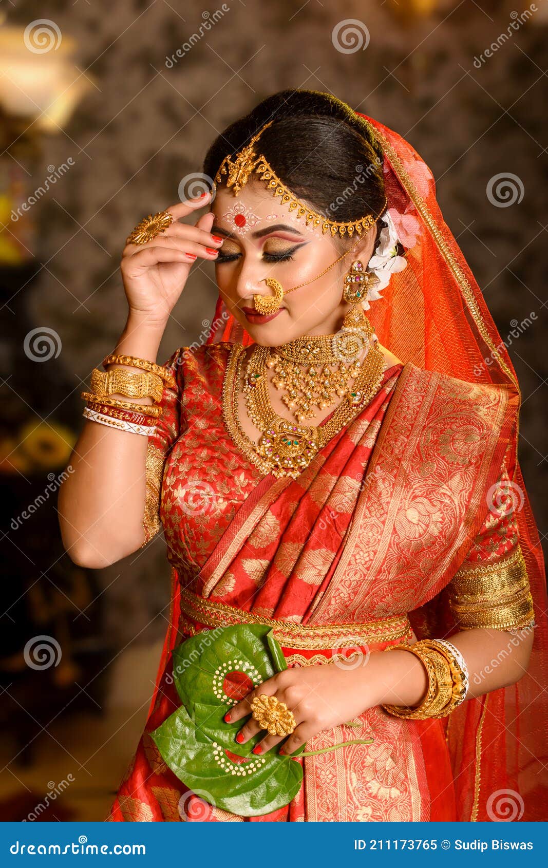 Portrait of Very Beautiful Indian Bride Holding Betel Leaf ...