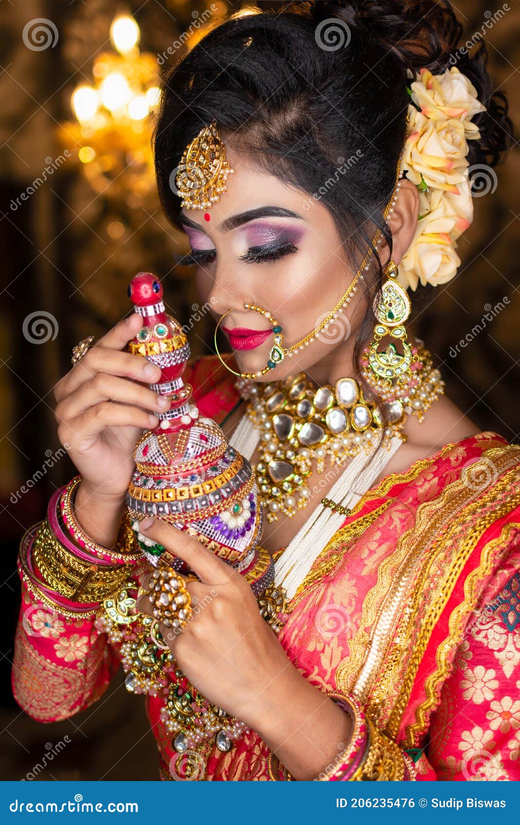 Portrait of Very Beautiful Indian Bride Holding Traditional Wooden ...