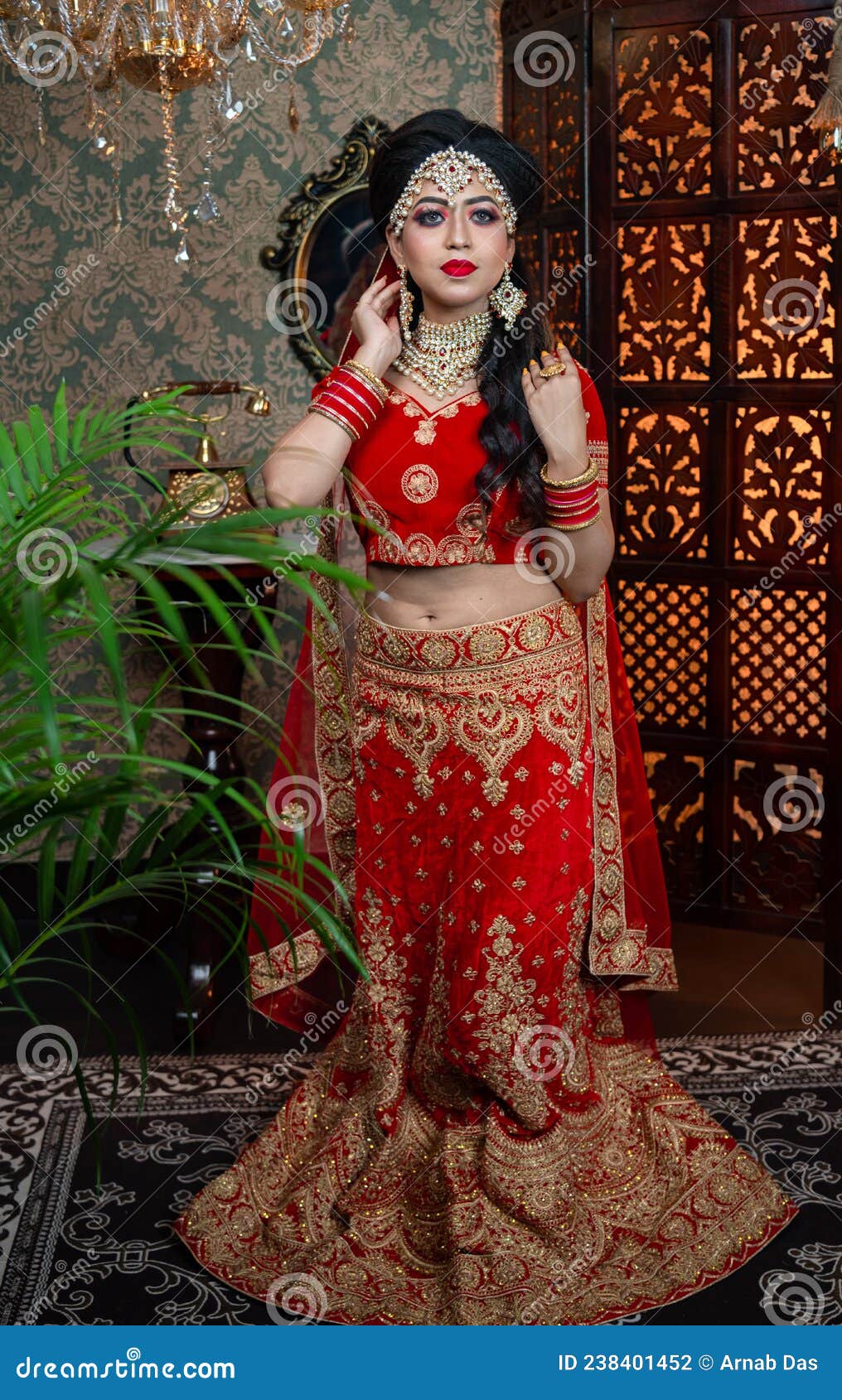 Portrait of Very Beautiful Indian Bride in Red Lehenga Showing ...
