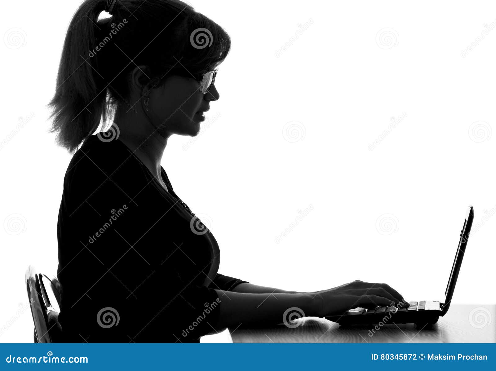 portrait of a visually impaired woman working on laptop