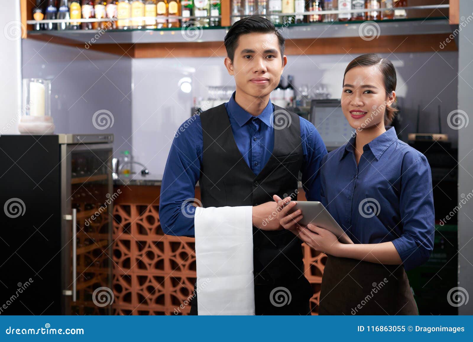 Bar workers stock image. Image of smiling, working, restaurant 116863055