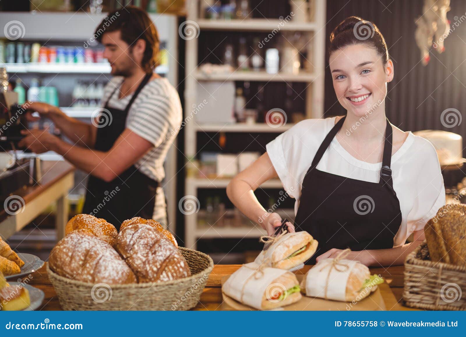 Portrait of Waitress Standing at Counter with Sandwiches and Bread Roll Stock Photo Image of