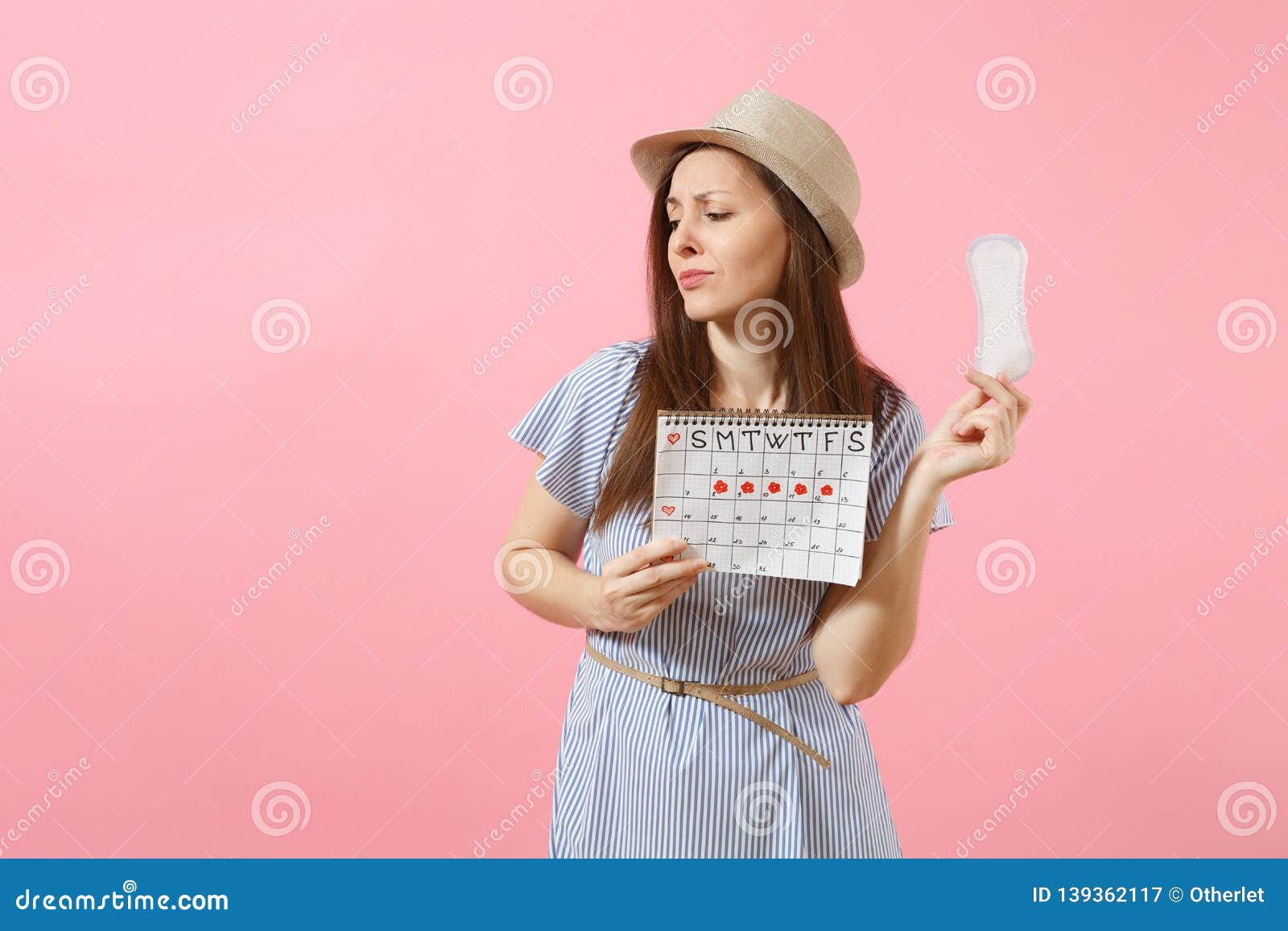 Portrait Of Woman In Blue Dress Hat Holding Sanitary Napkin Female