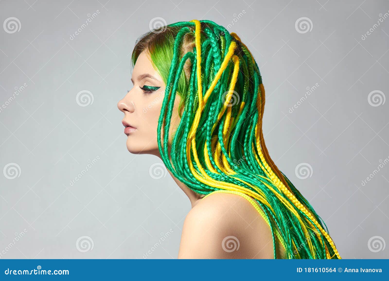 Portrait of a Woman with Creatively Colored Hair in Green and Yellow Color.  Colorful Bright Dreadlocks, Beautiful Modern Makeup Stock Photo - Image of  model, braid: 181610564