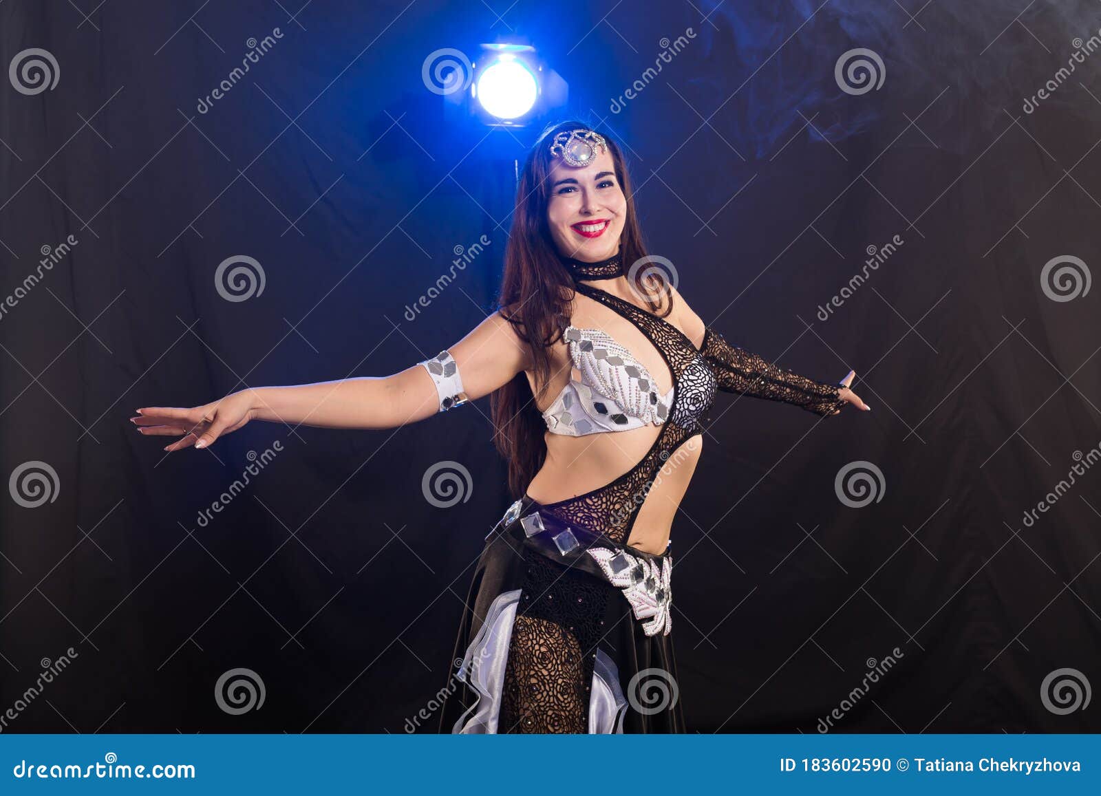 Portrait of a Woman in Oriental Costume Performing Belly Dance