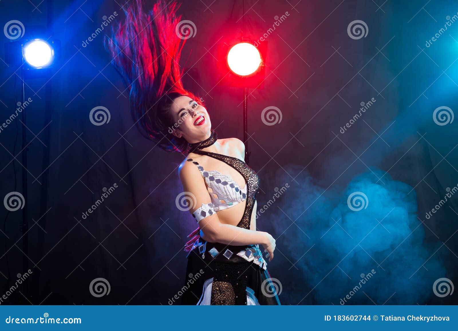 Portrait of a Woman in Oriental Costume Performing Belly Dance. Tribal  Fusion Dance Concept. Stock Photo - Image of dancer, arms: 183602590