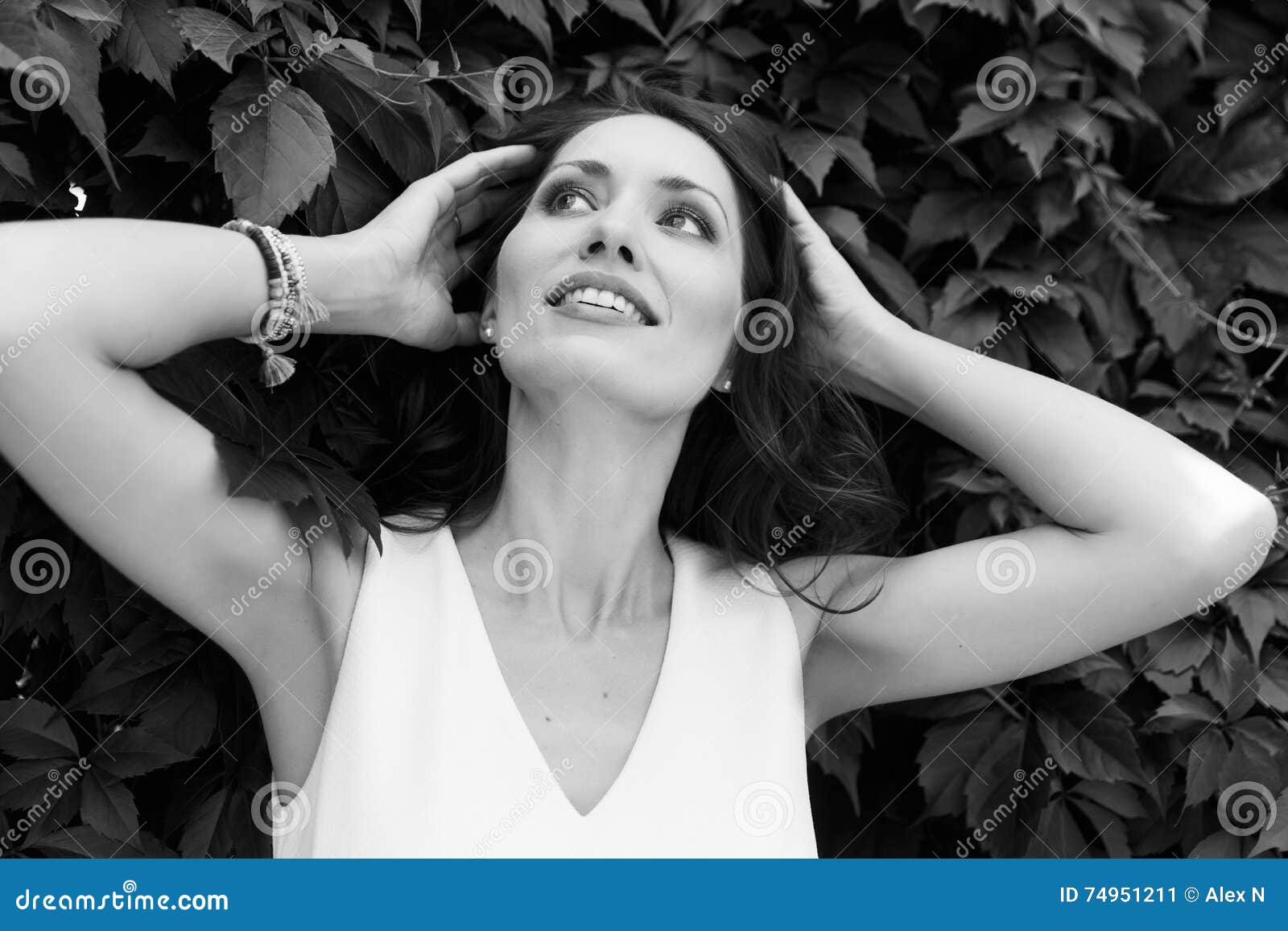 Portrait of Woman Touching Her Hair and Looking Up Stock Image - Image ...