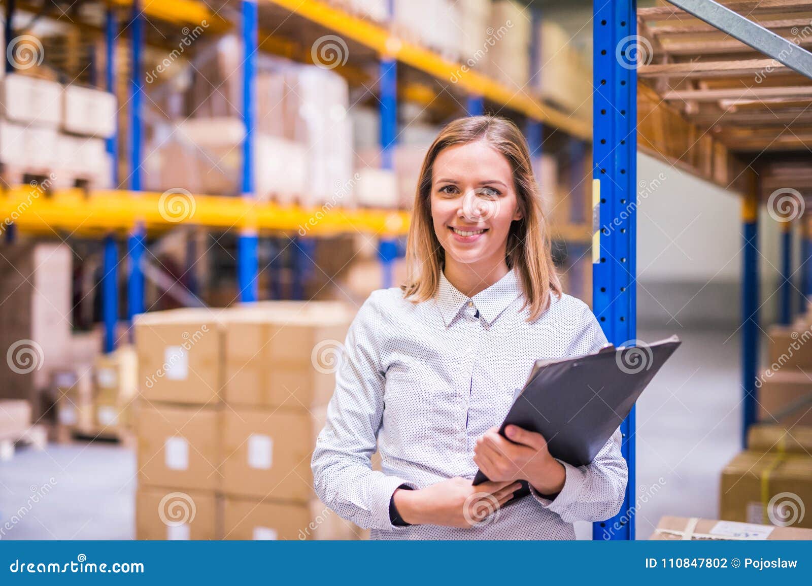 portrait of a woman warehouse worker or supervisor.