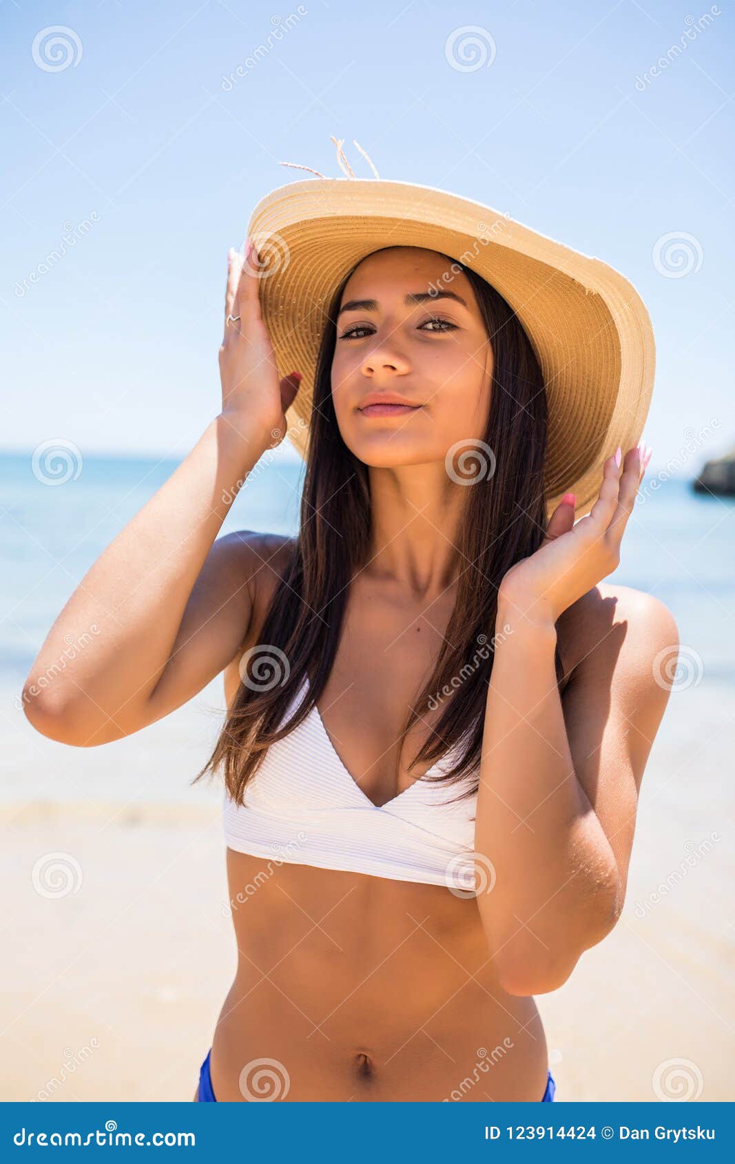 https://thumbs.dreamstime.com/z/portrait-woman-white-blue-bikini-tropical-beach-looking-camera-beautiful-latin-girl-swimwear-straw-hat-copy-123914424.jpg