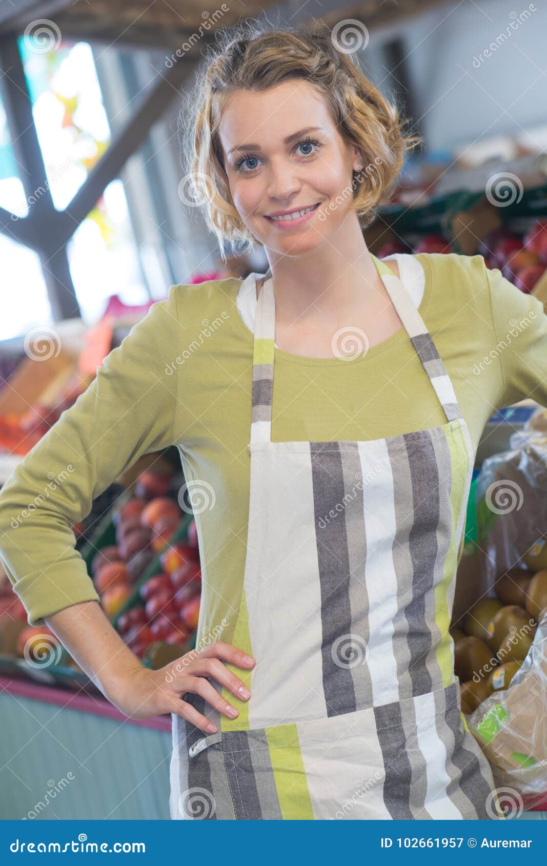 portrait worker in green grocers
