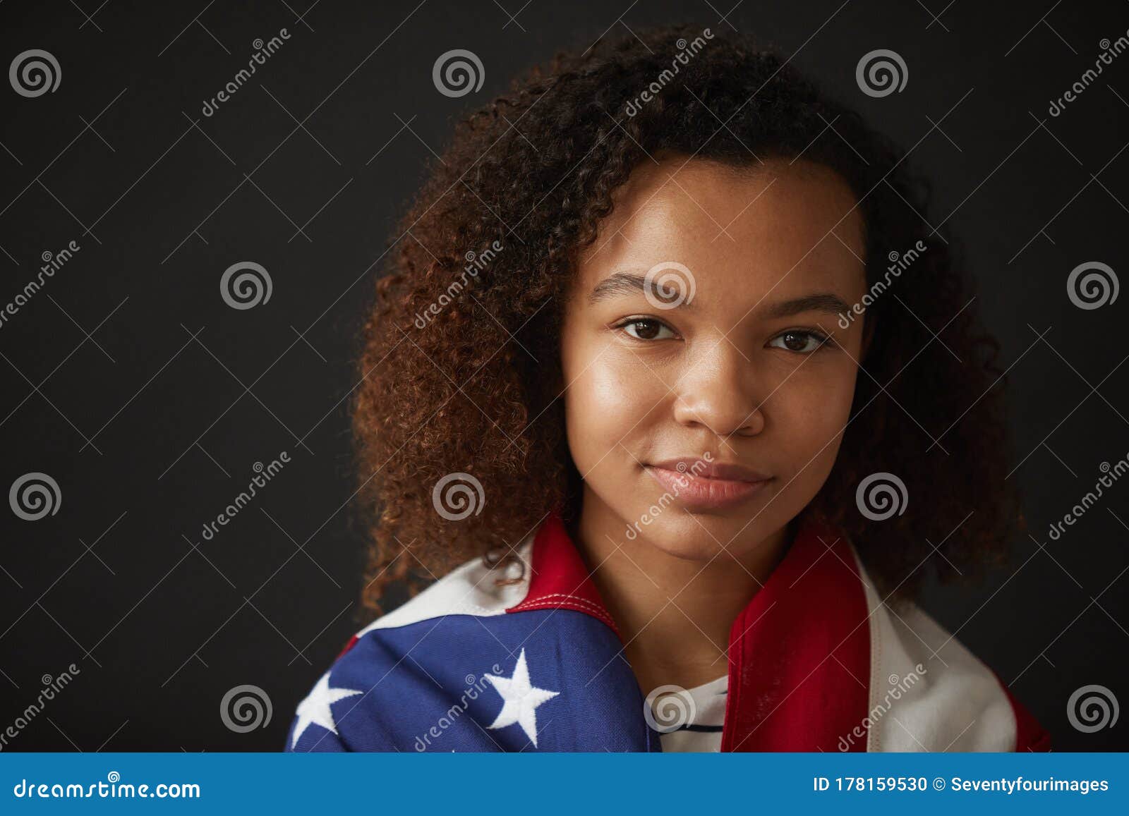 Portrait of Young African Woman Holding Flag on Black Stock Photo ...