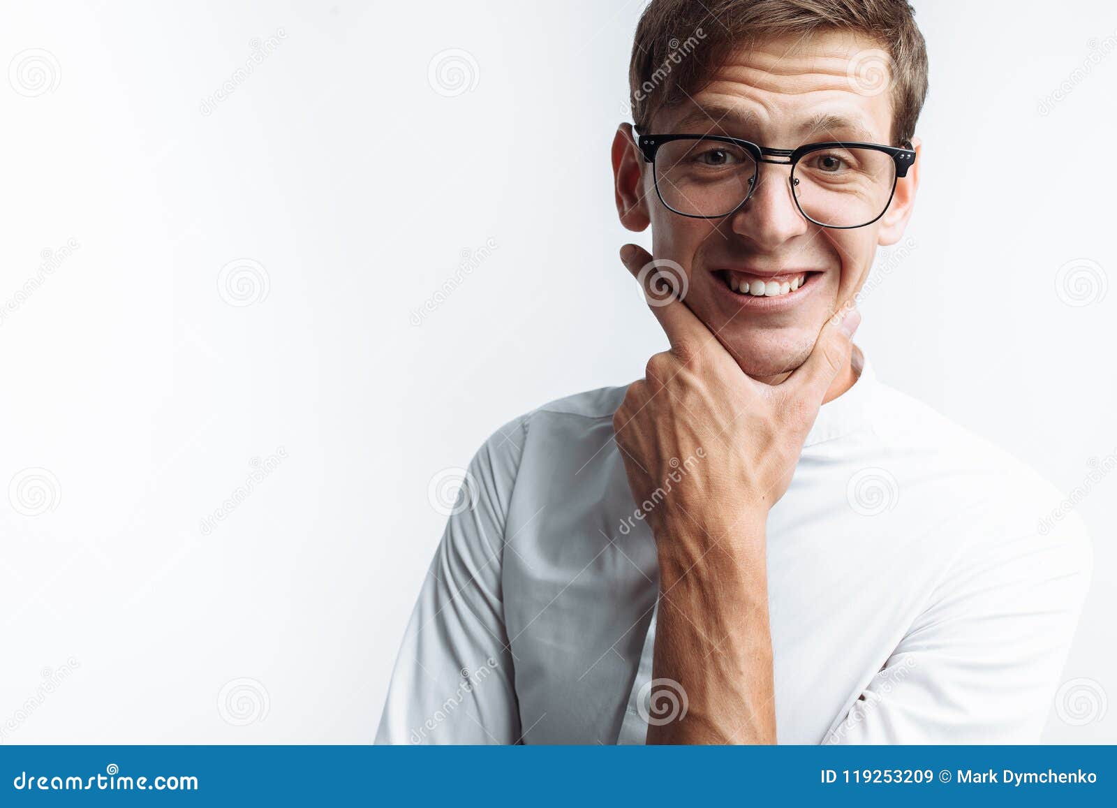 Portrait Of Young Attractive Guy In Glasses Depicting Joy ...