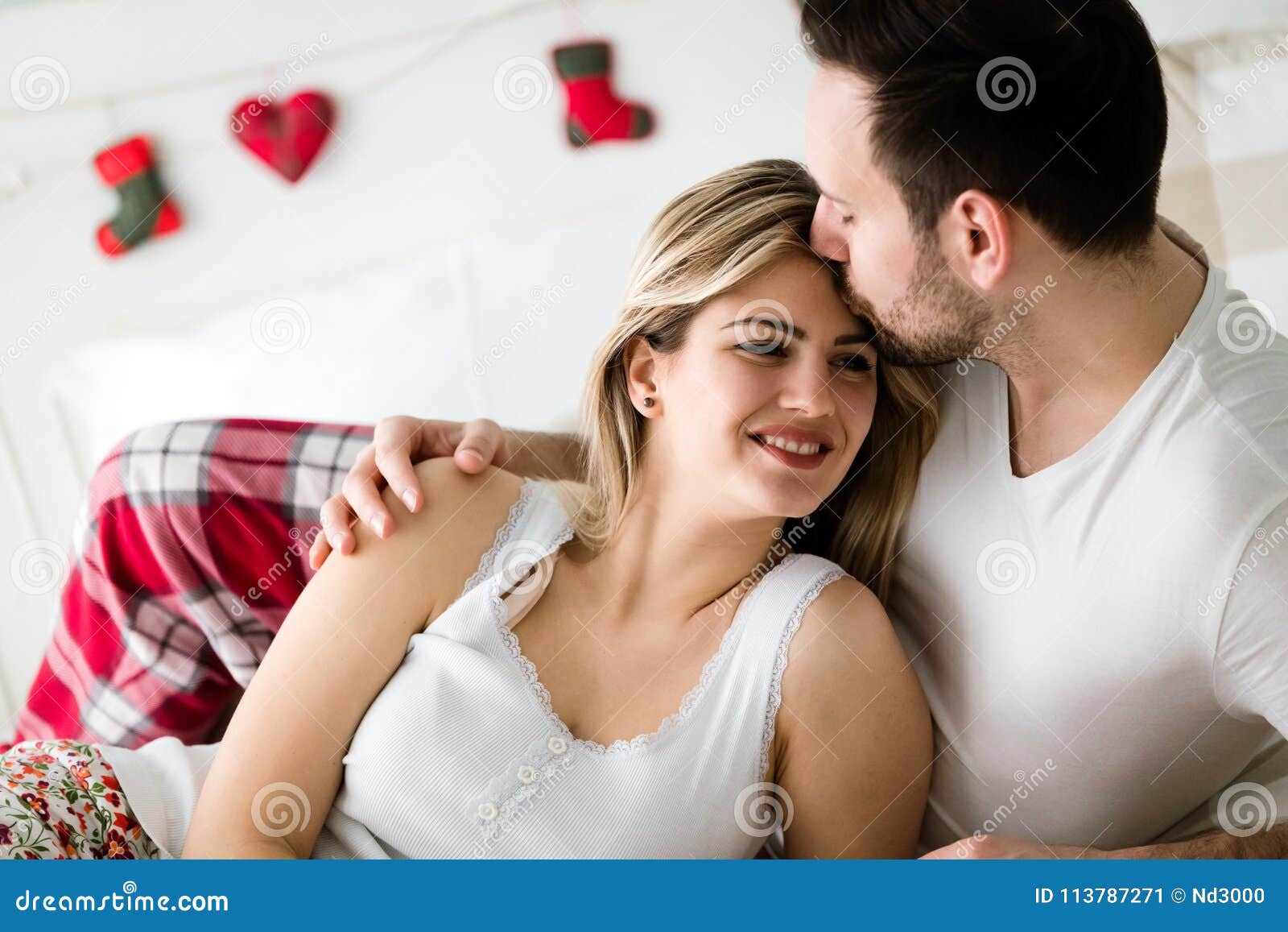 Portrait Of Young Loving Couple In Bedroom Stock Image Image Of