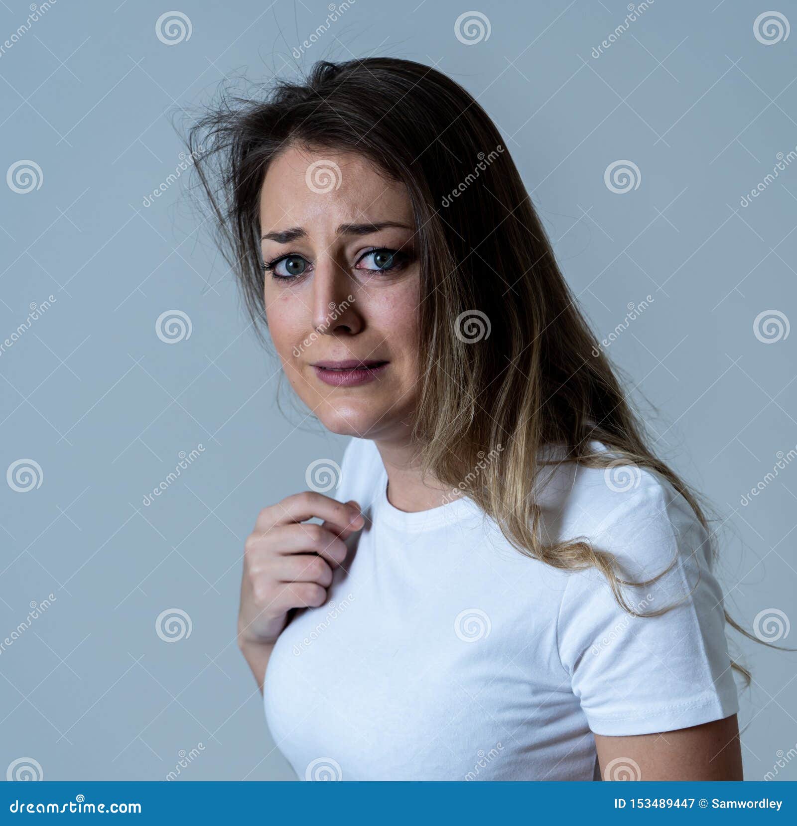 Portrait Of A Young Attractive Woman Looking Scared And Shockedhuman