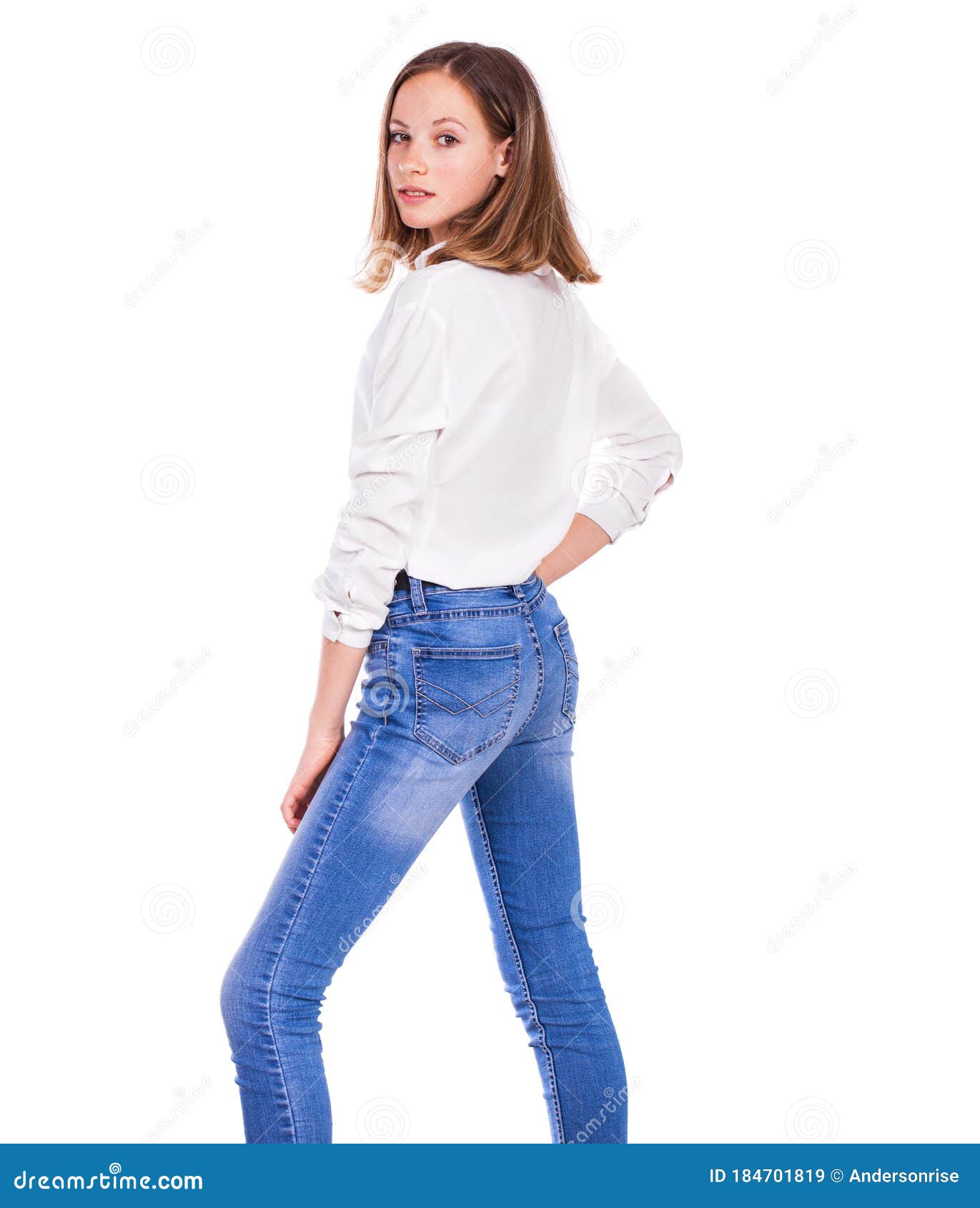 Portrait of a Young Beautiful Blonde Model in Blue Jeans and White ...