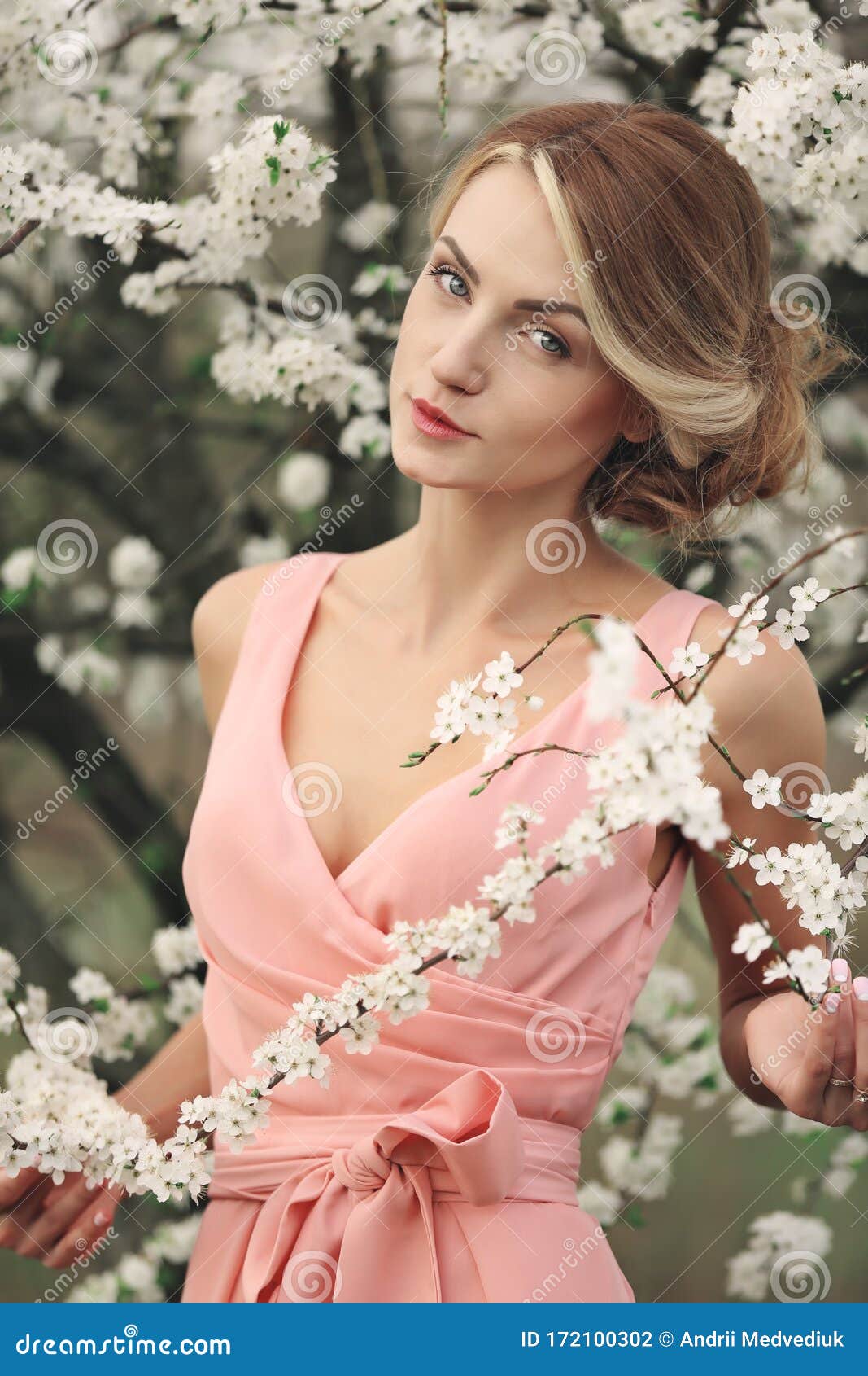 Pink Dress Near Blooming Tree ...