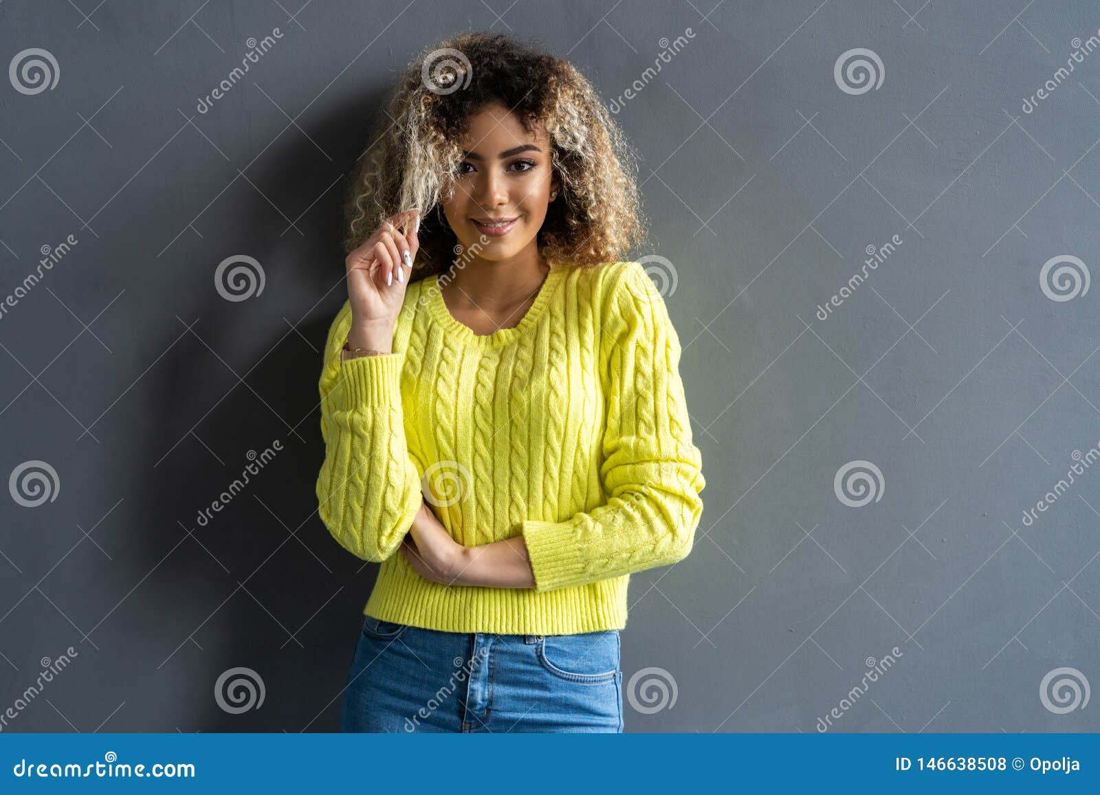 Portrait Of Young Beautiful Cute Cheerful Black Girl Smiling Looking At Camera Over Gray 