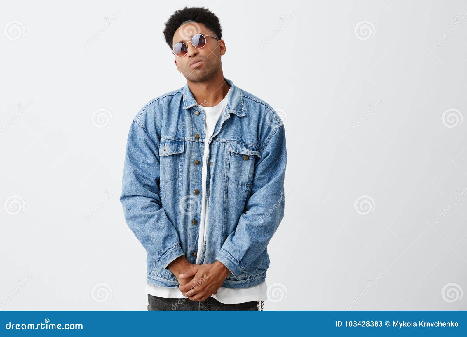 Portrait of Young Beautiful Dark-skinned Man with Afro Hairstyle in Casual  Fashionable Clothes and Tan Glasses Holding Stock Image - Image of black,  background: 103428383