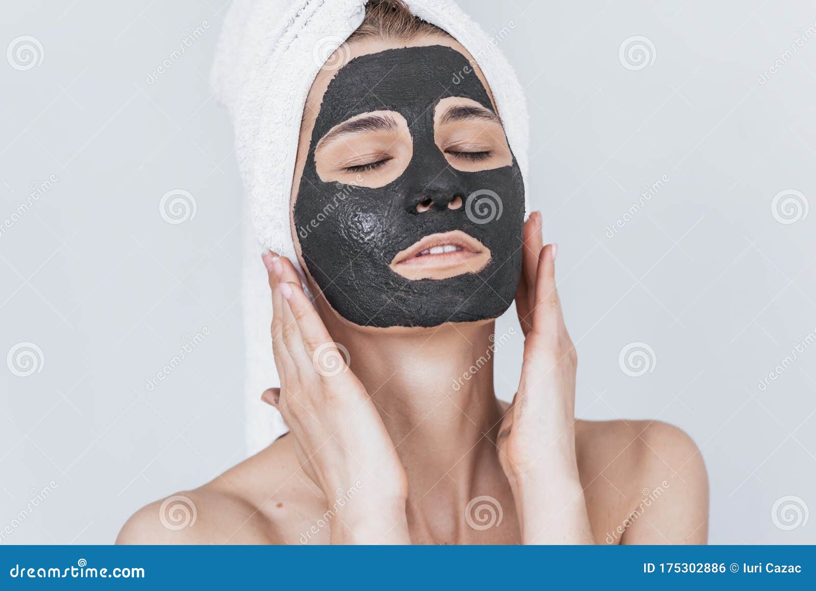 Portrait Of Young Beautiful Female Applying Black Clay Mask, Doing Beauty  Wellness Treatment On Her Face Skin. Horizontal Shot Of Stock Photo - Image  of isolated, people: 175302886