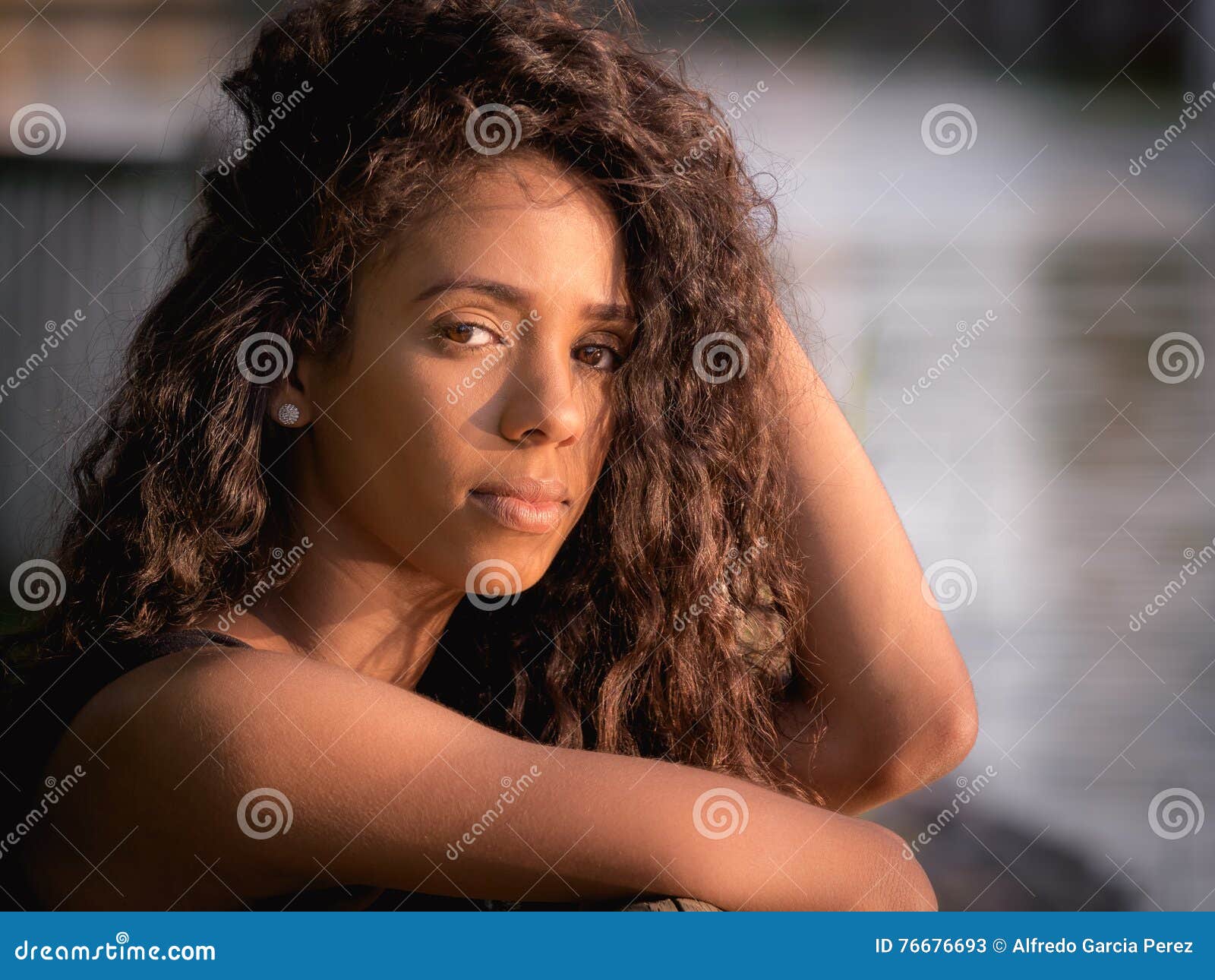 https://thumbs.dreamstime.com/z/portrait-young-beautiful-latina-woman-looking-camera-natural-light-76676693.jpg
