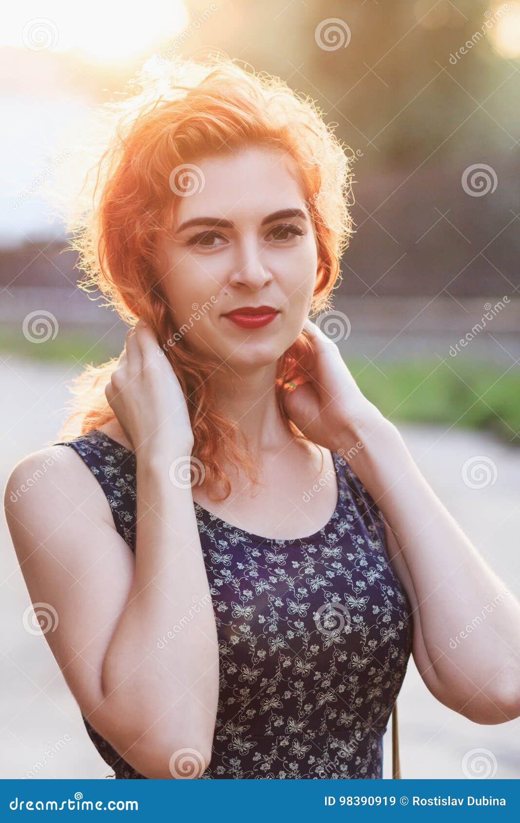 Portrait of a Young Beautiful Red-haired Girl in the Sunset. Stock ...