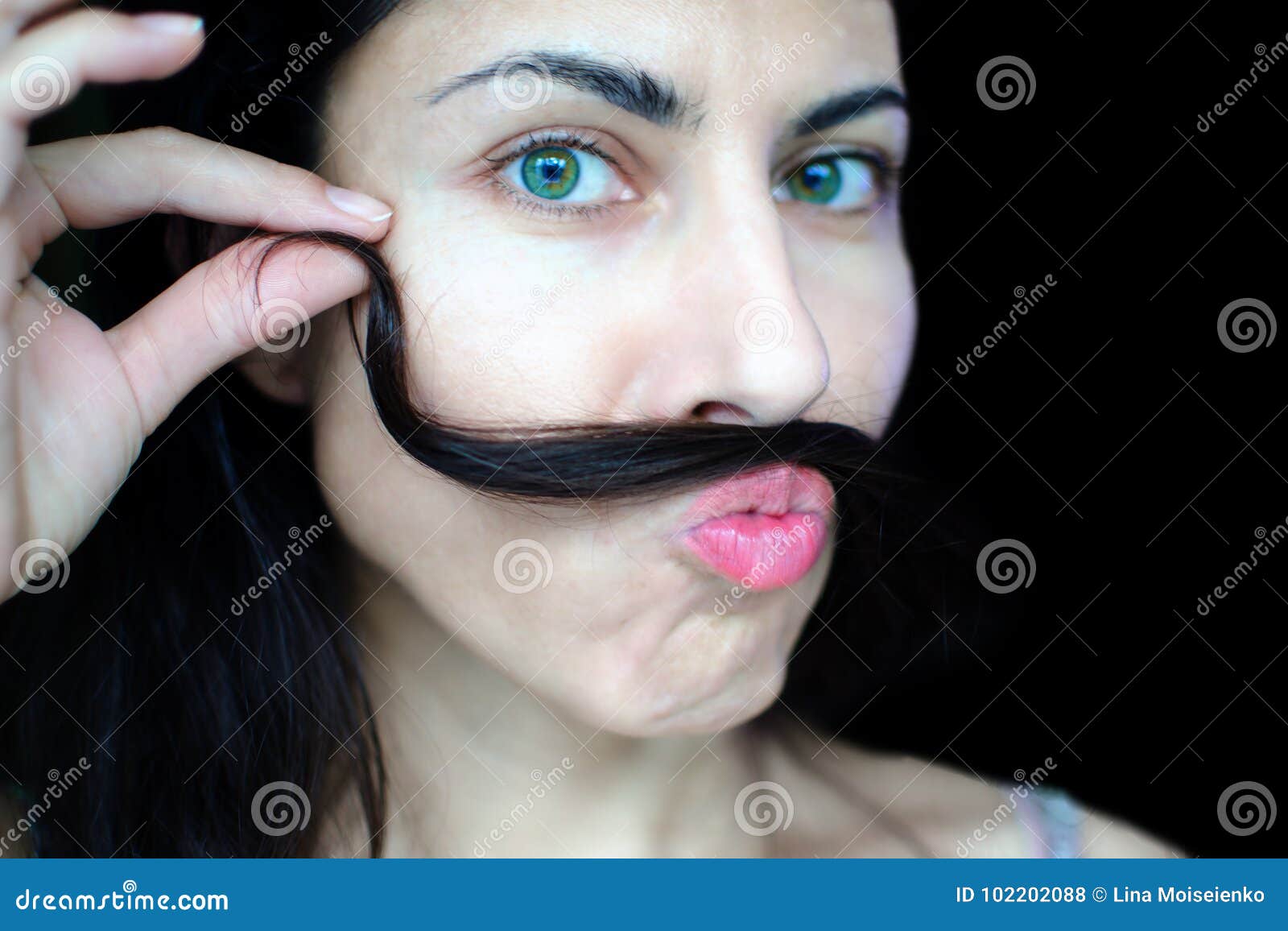 Portrait of a Young Beautiful Woman with Dark Hair Holding a Strand of Her Hair Over Her Upper Lip. Stock Photo - Image of epilating, area: 102202088 Portrait of a Young Beautiful Woman with Dark Hair Holding a Strand of Her Hair Over Her Upper Lip. Stock Photo - Image of epilating, area: 102202088