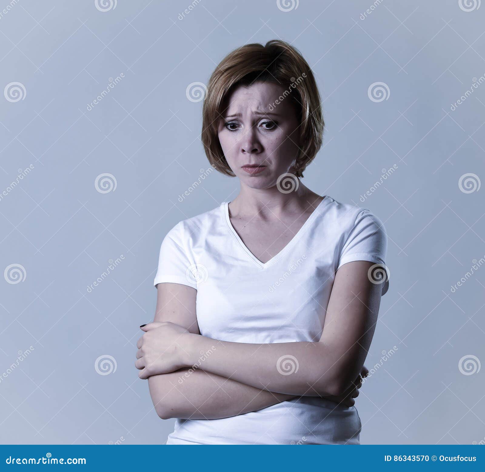 portrait young beautiful woman on her 30s sad and depressed in breakdown suffering depression