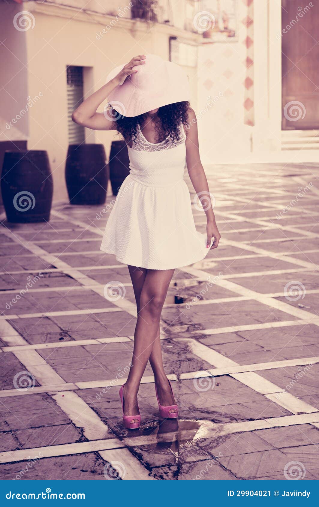 Young Black Woman Wearing Dress And Sun Hat, Afro 