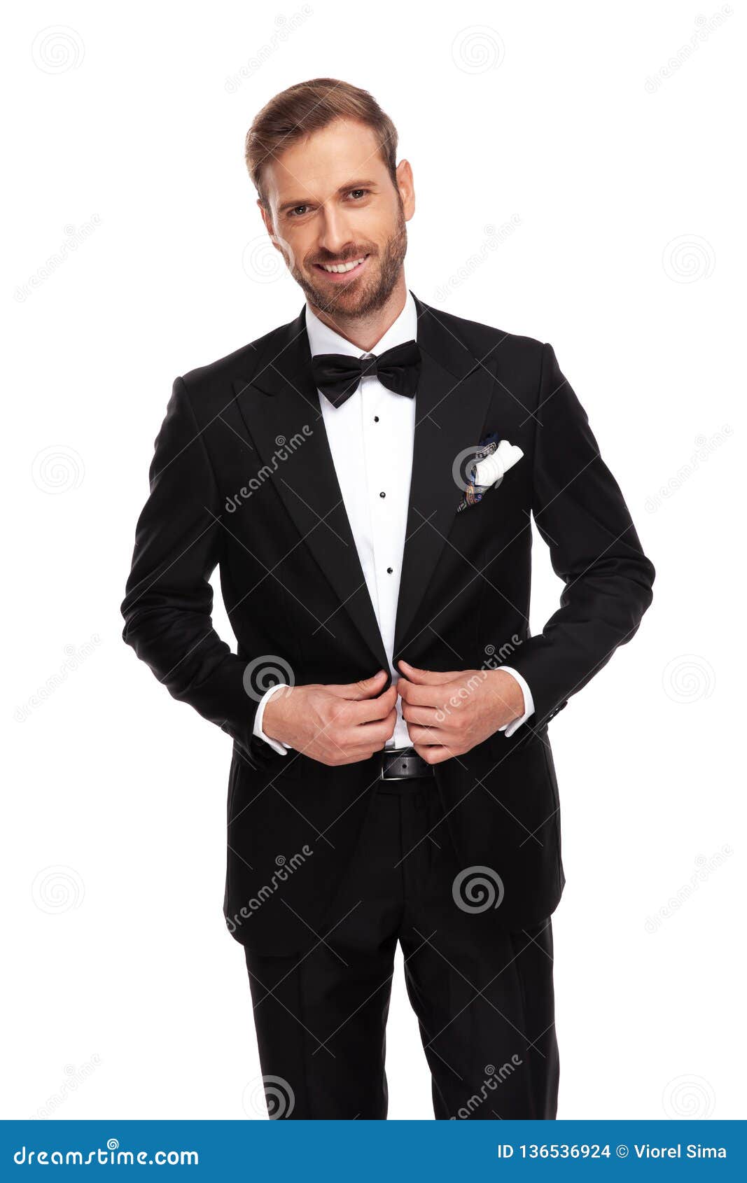 Portrait of Young Businessman Buttoning His Black Suit Stock Photo ...
