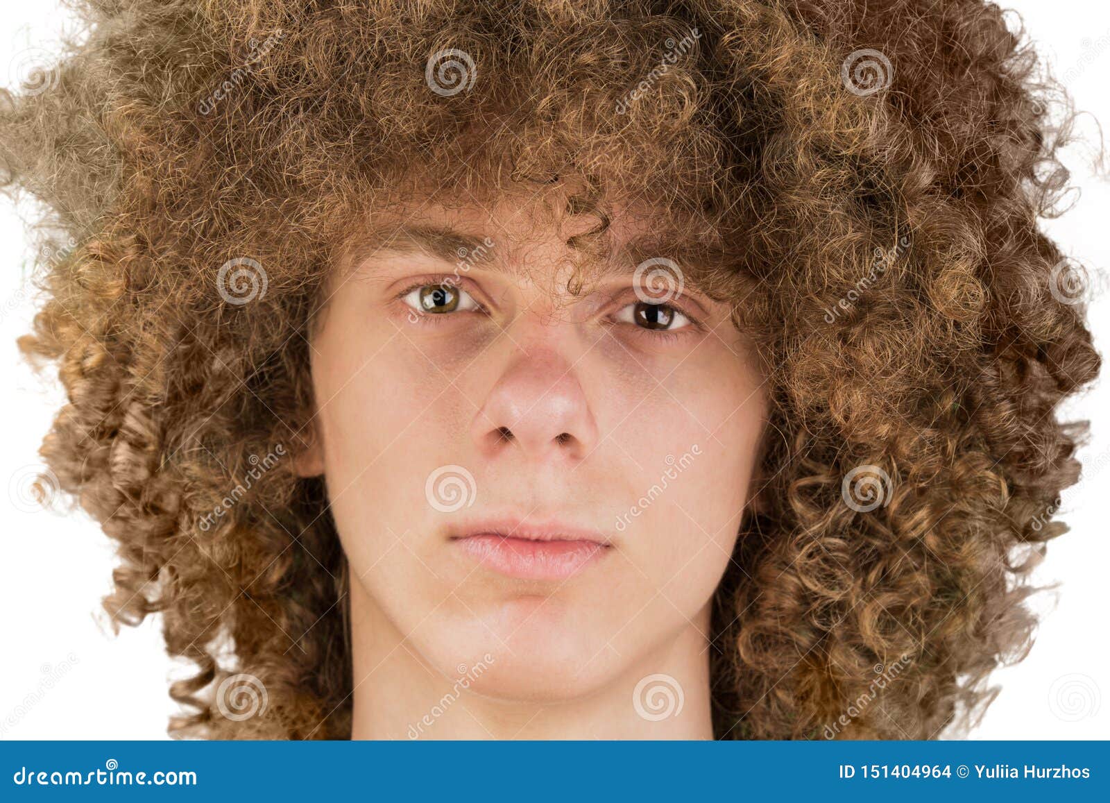 Portrait of a Young Curly European Man with Long Curly Hair and a Defiant Gaze Looks into the Frame Close-up. Very Lush Male Hair Stock Photo - Image of hairstyle, decision: 151404964 Portrait of a Young Curly European Man with Long Curly Hair and a Defiant Gaze Looks into the Frame Close-up. Very Lush Male Hair Stock Photo - Image of hairstyle, decision: 151404964