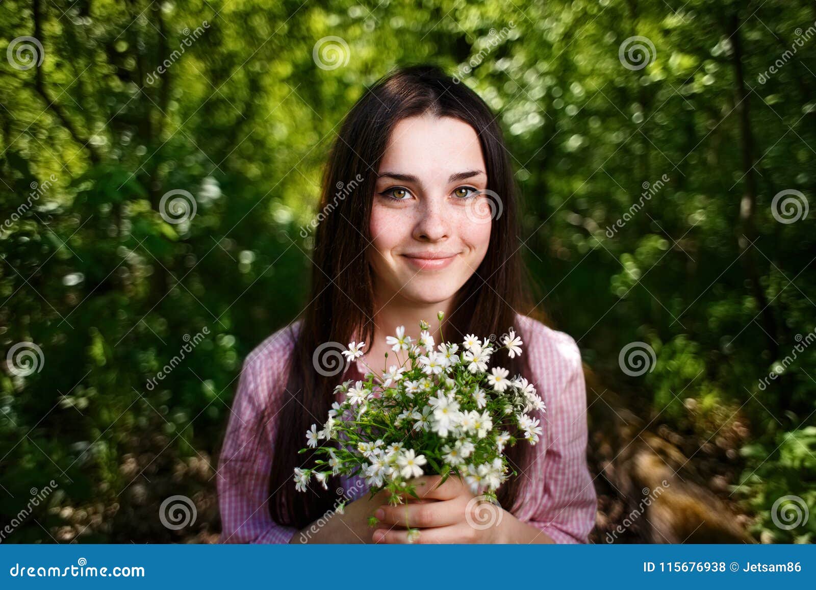 Young Cute Smiling Woman with a Bouquet of Petite Forest Flowers Stock ...