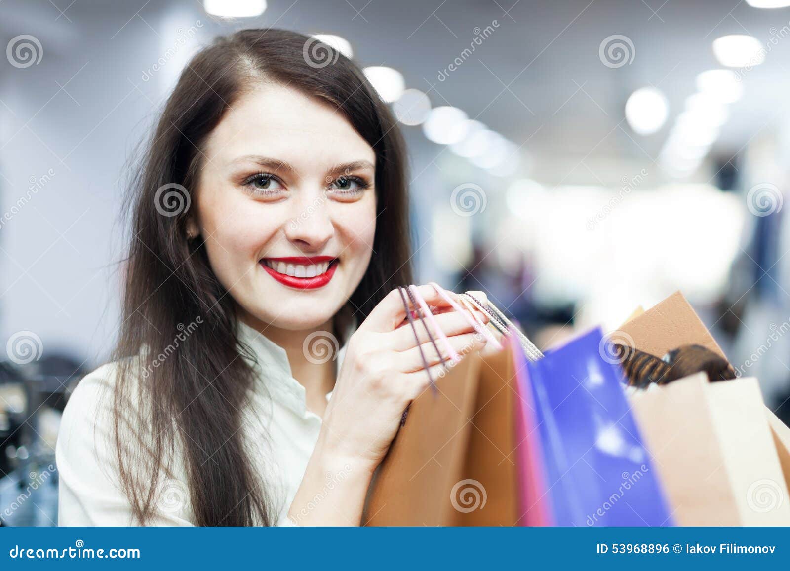 Portrait of Young Female Buyer Stock Photo - Image of casual, holding ...