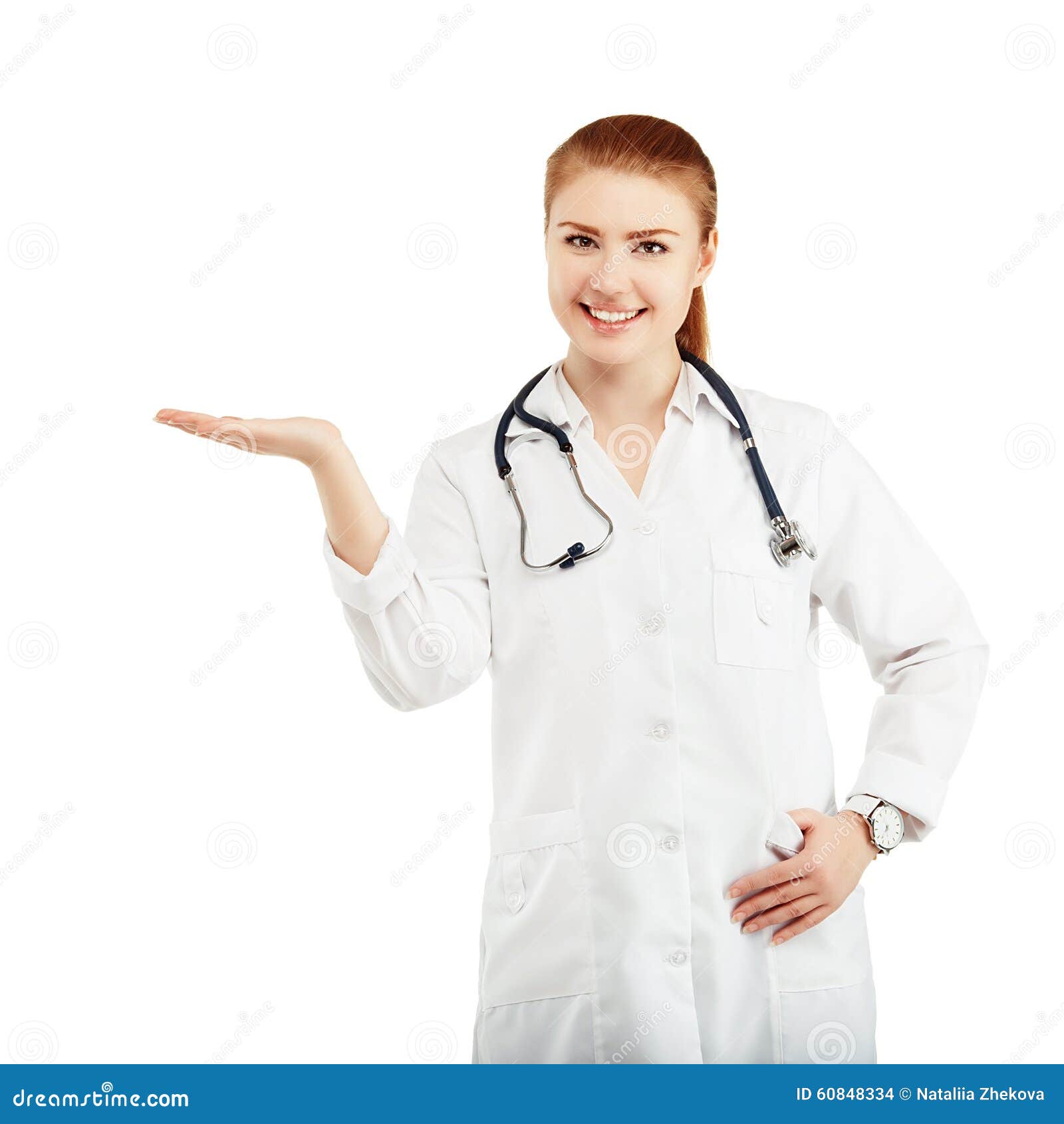 Portrait Of A Young Female Doctor In A White Coat Holding In Han ...