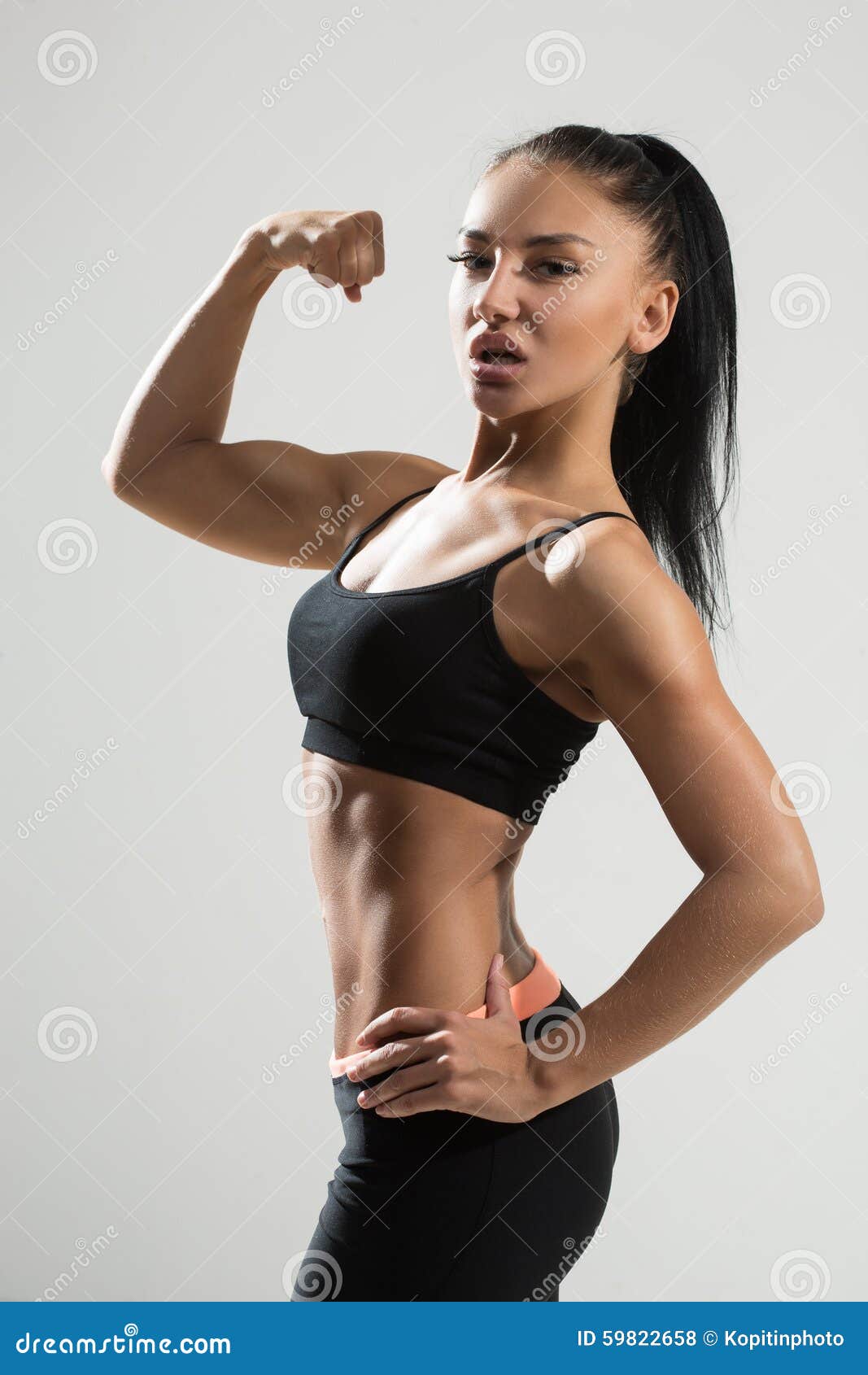 634 Woman Shows Biceps Stock Photos - Free & Royalty-Free Stock Photos from  Dreamstime