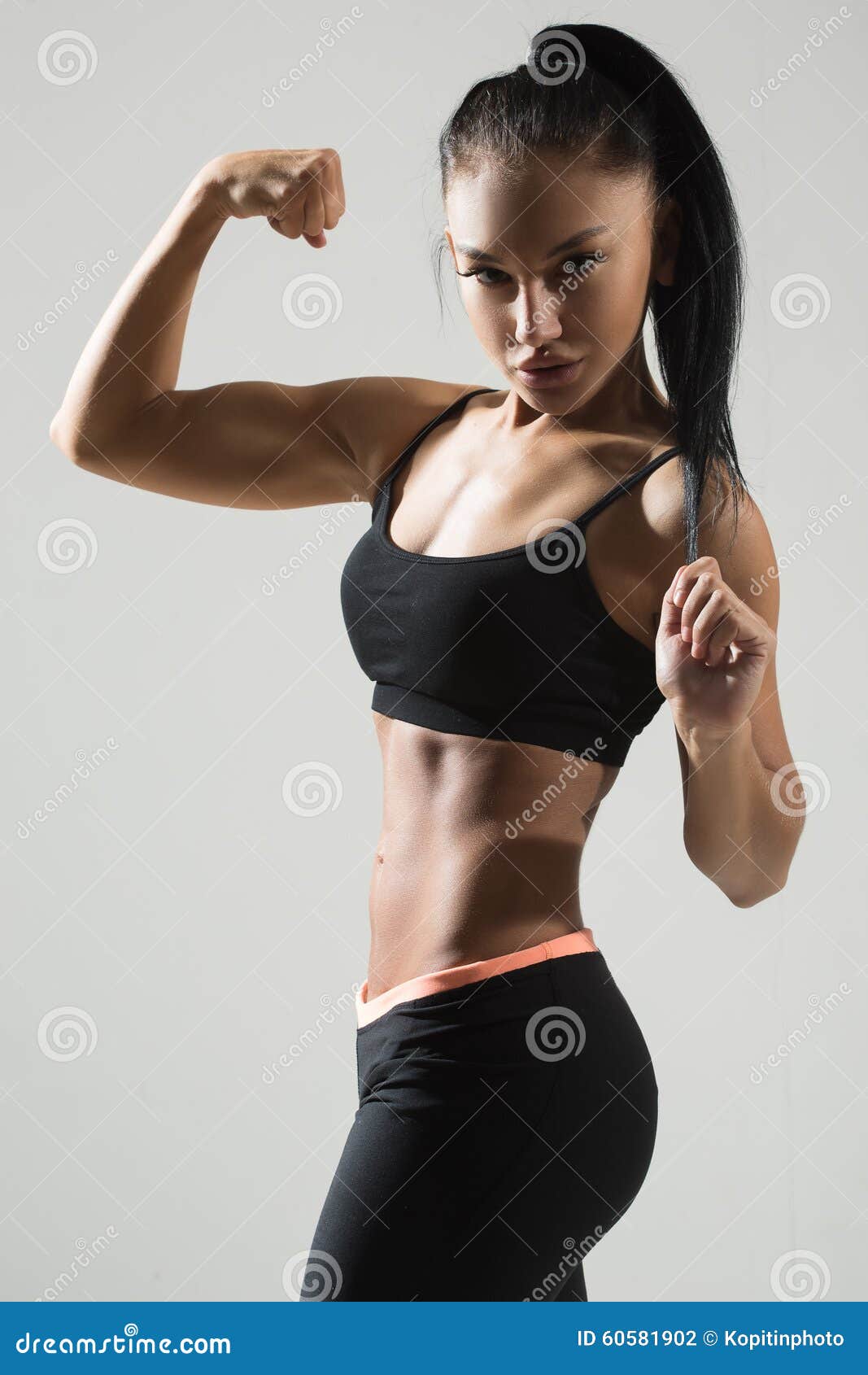 219 Portrait Young Fitness Woman Shows Biceps Stock Photos - Free