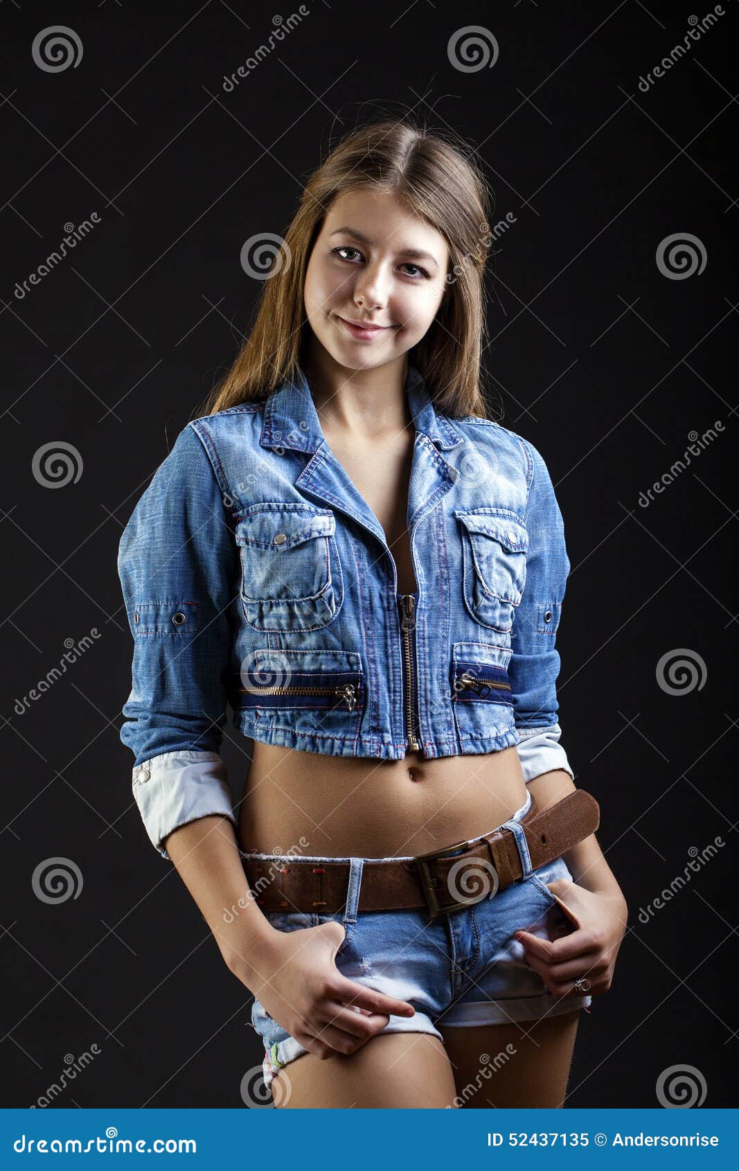 Portrait Young Girl in a Blue Jeans Jacket in Dark Studio Stock Image ...