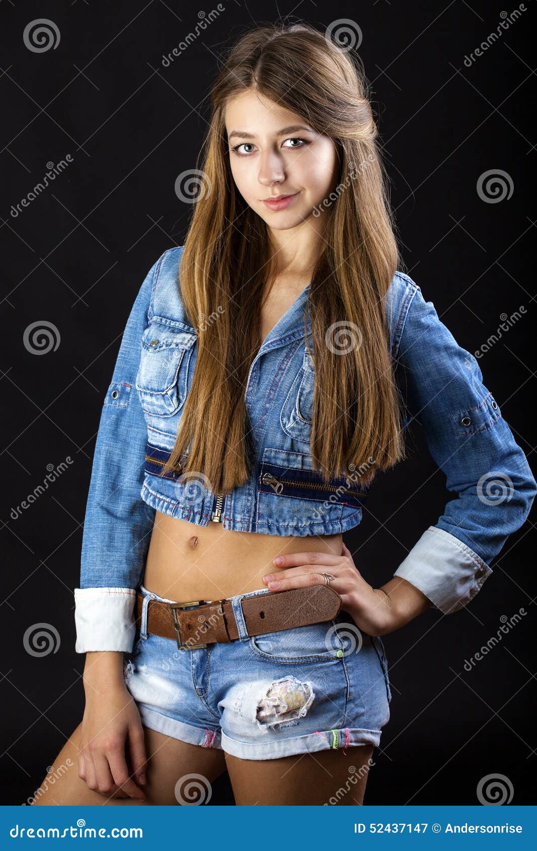 Portrait Young Girl in a Blue Jeans Jacket and Shorts in Dark St Stock ...