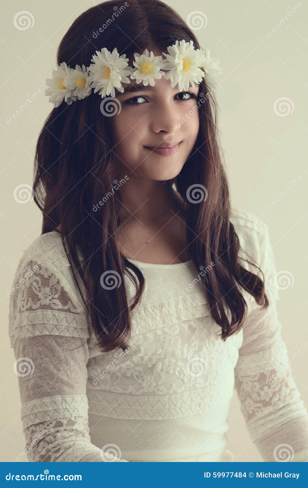Young Woman Touching Flower Wreath On Her Head Stock Photo 