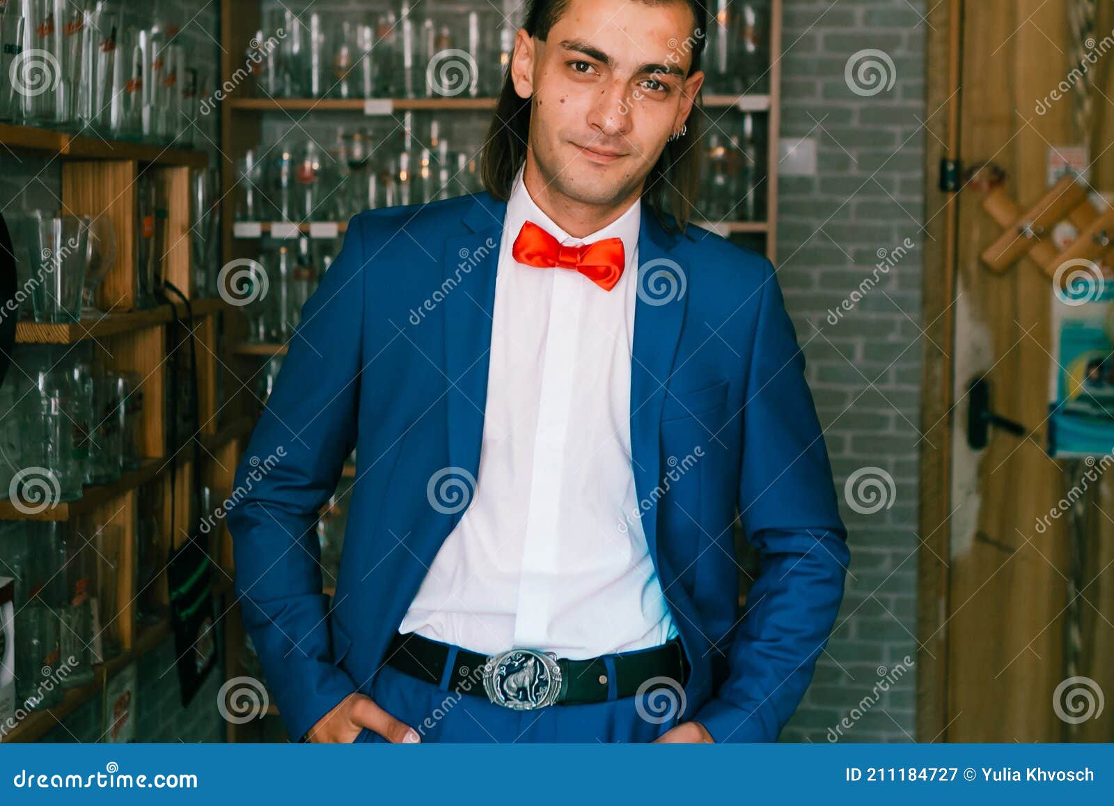 Portrait of Young Handsome in Blue Suit with Red Bow Image - Image of look: 211184727