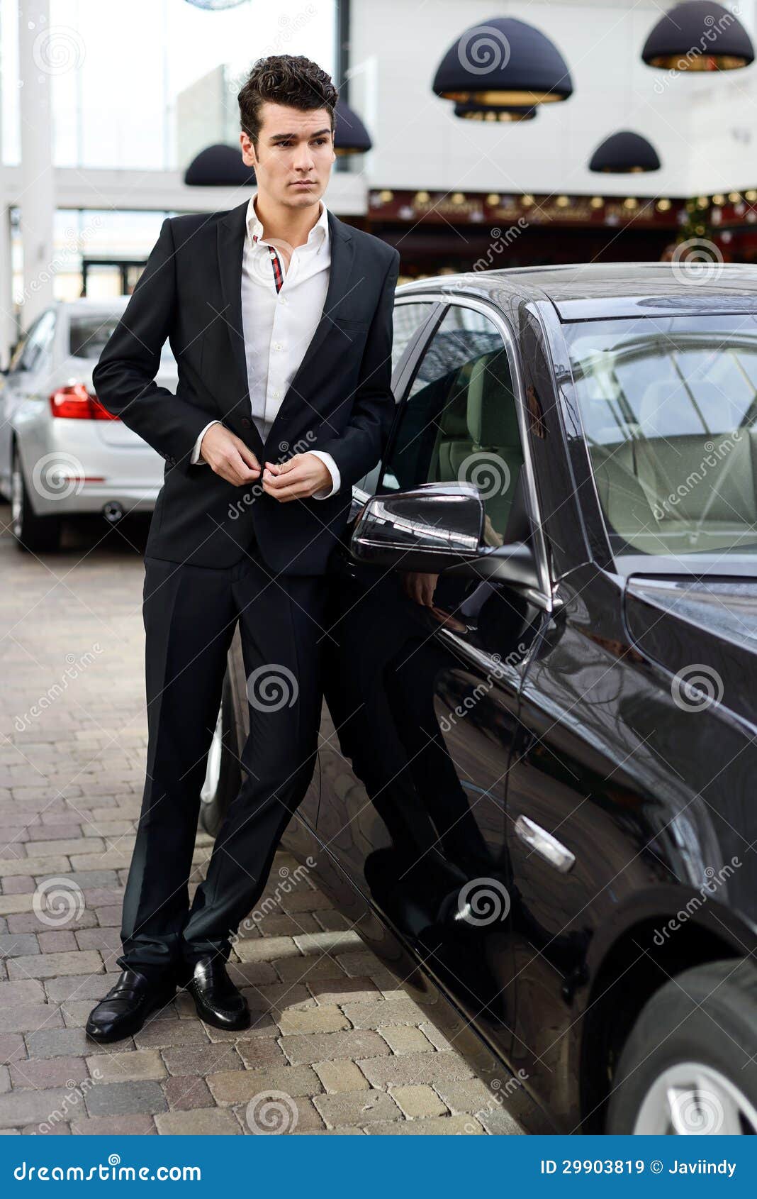 Young Handsome Man, Model Of Fashion, With Luxury Cars Young Handsome Man, Model Of Fashion, With Luxury Cars