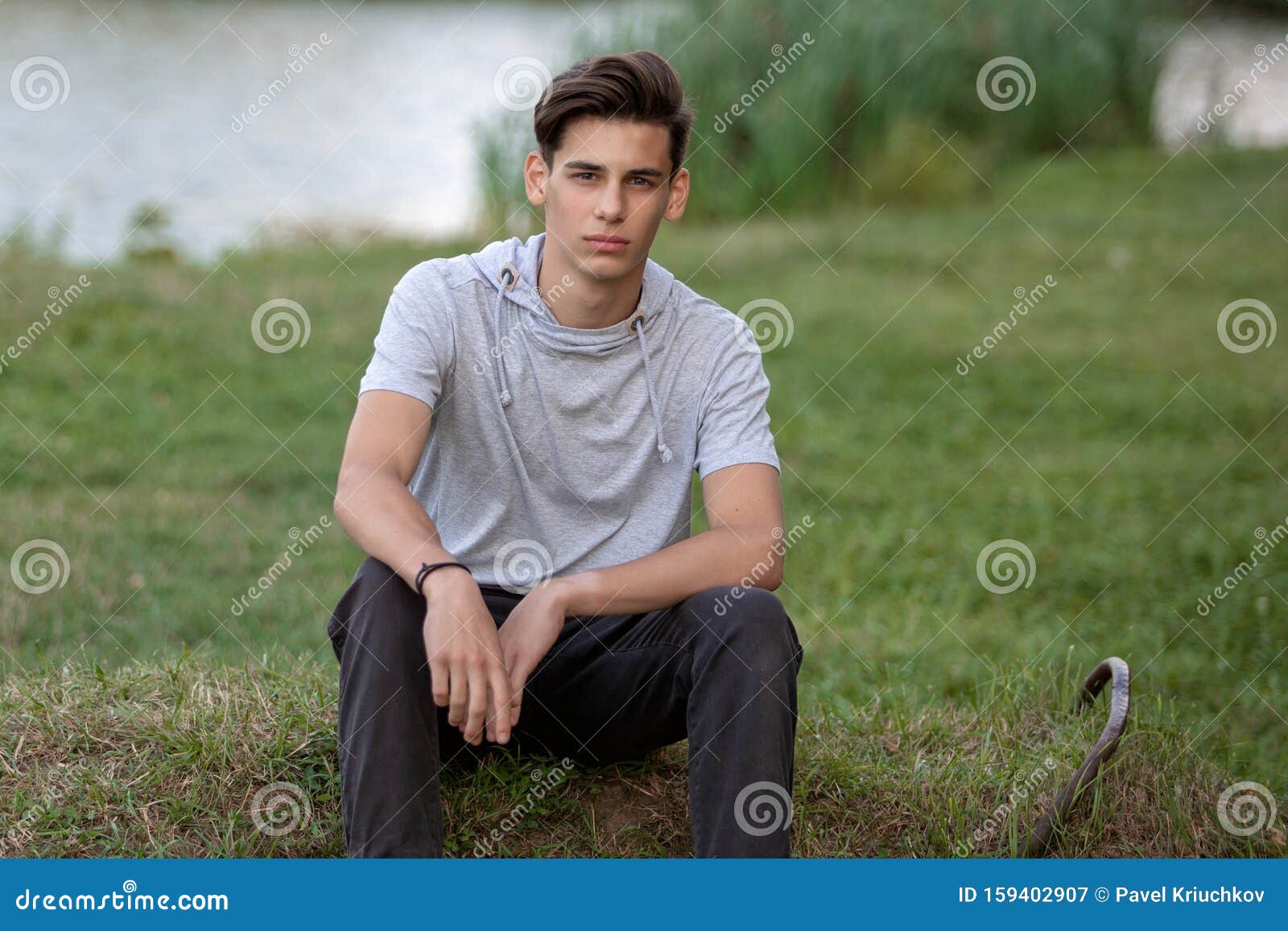 Portrait of a Young Handsome Man Outdoors. Teenager Stock Image - Image ...