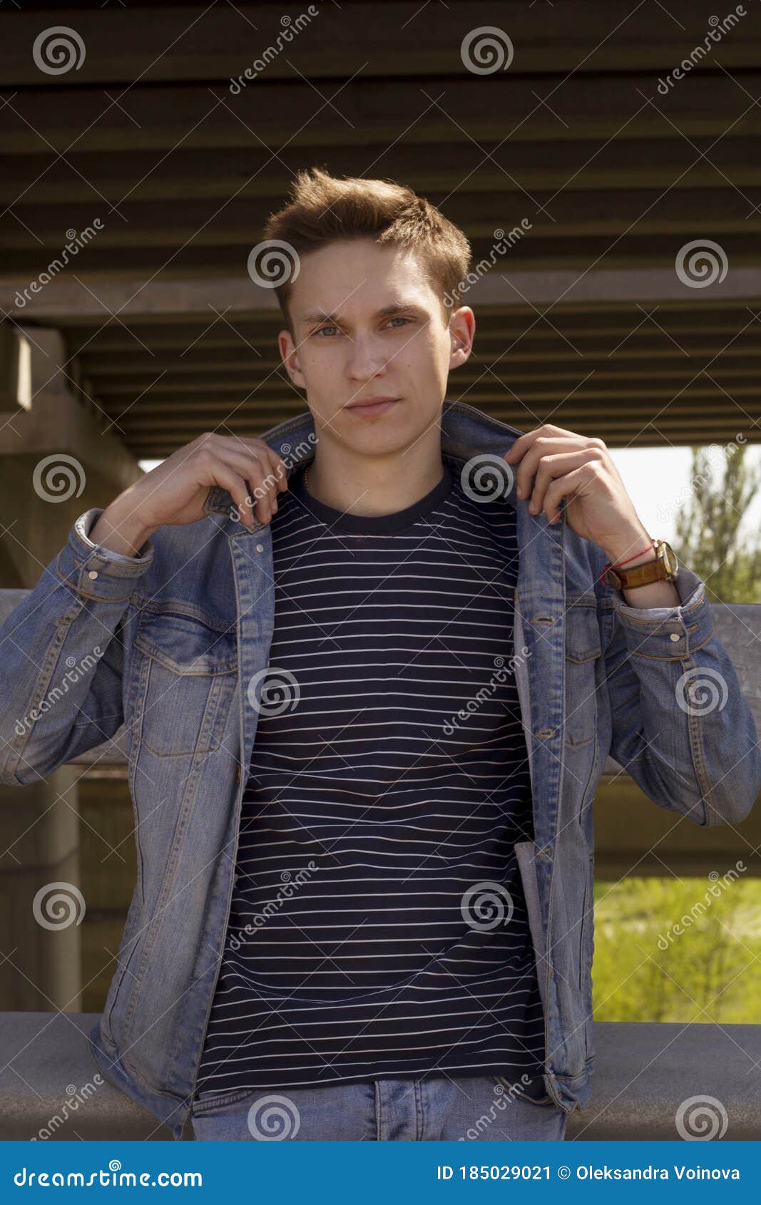 Portrait of Young Handsome Man Wearing Jeans Clothes Outside at Nature ...