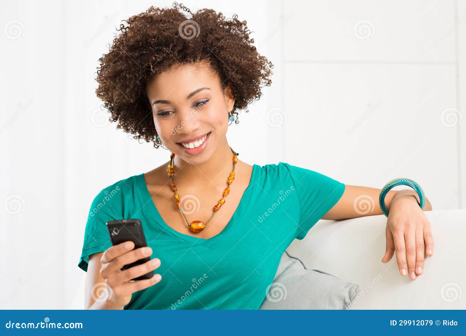 young woman looking at cellphone