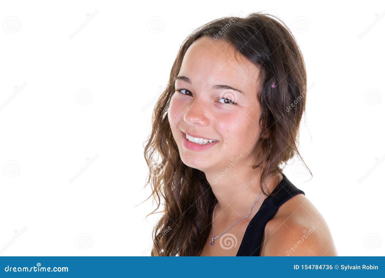Portrait of Young Happy Teenage Girl Smiling in White Copy Space ...
