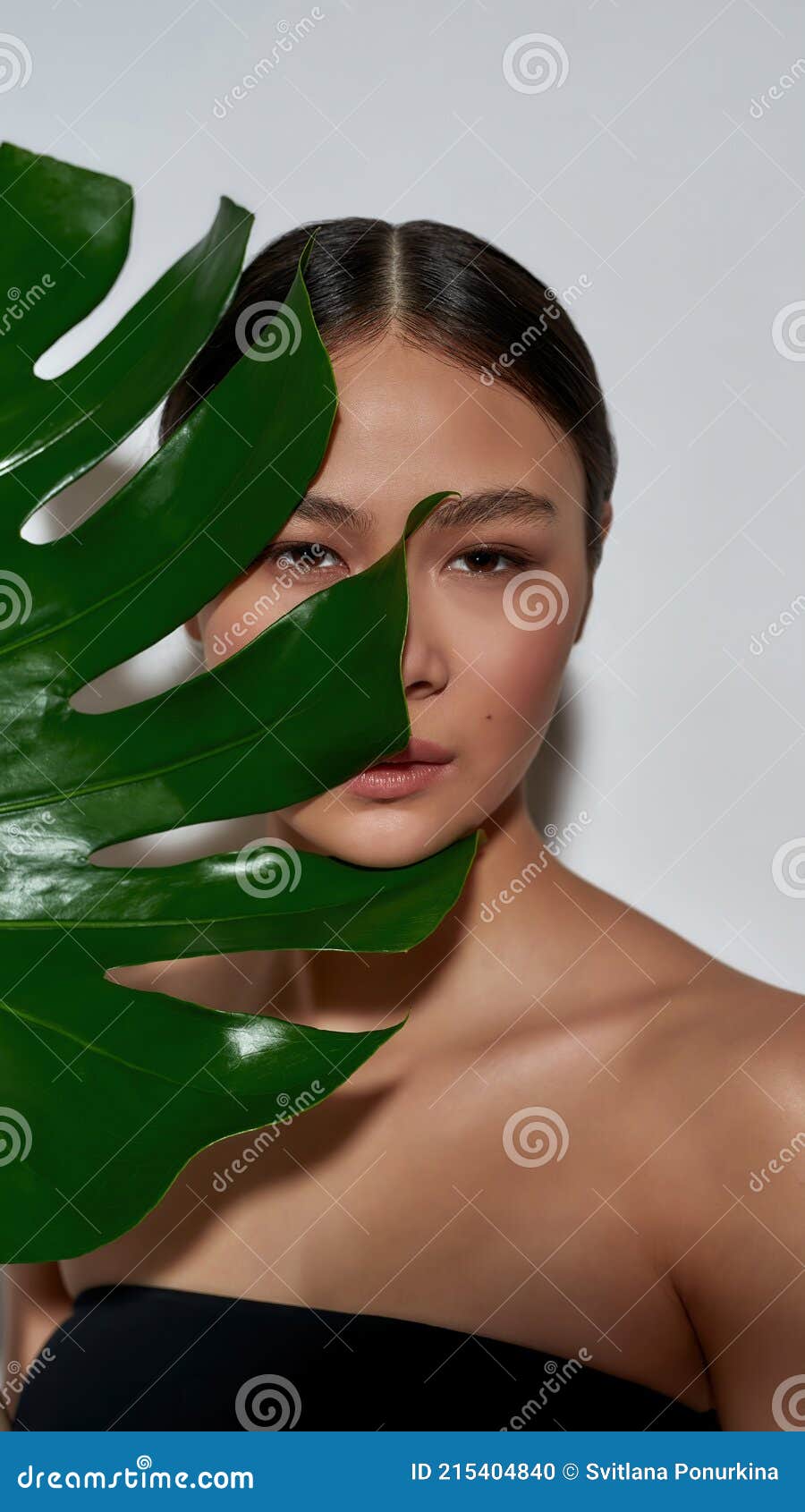 Top Asian Girls Nude - Portrait of a Young Magnificent Half-naked Asian Girl in a Black Top Face  Half-hidden with a Monstera Leaf Stock Photo - Image of mood, emotion:  215404840