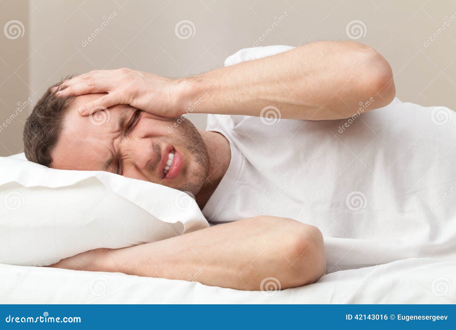 Portrait of Young Man in Bed with Headache Stock Photo Image of