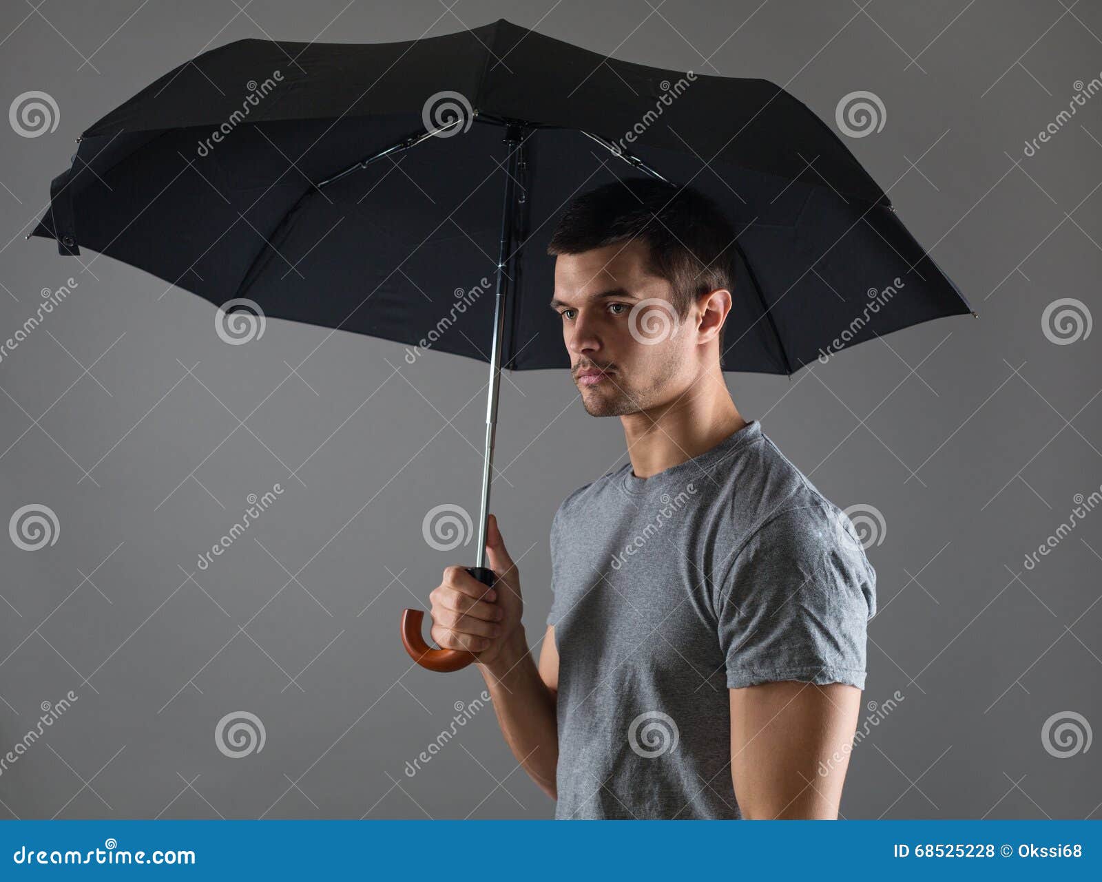 Portrait of a Young Man with a Black Umbrella Stock Photo Image of