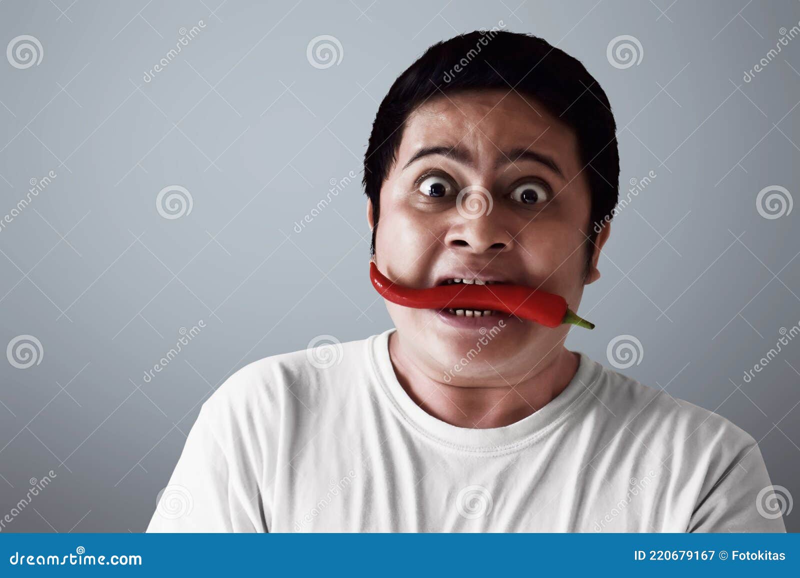 Portrait of Young Man Eat Chili Pepper Stock Image Image of heat