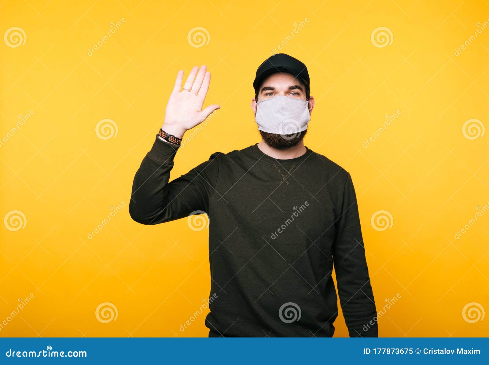 Download Young Man With Facial Mask Saying Hello Over Yellow Background Stock Image Image Of Gesture Male 177873675 PSD Mockup Templates